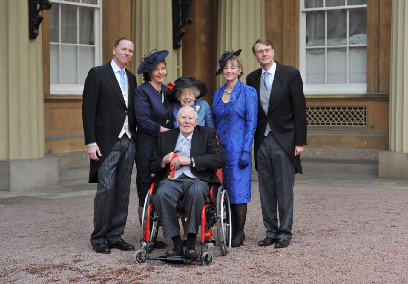 Outside Buckingham Palace with his family (PA)