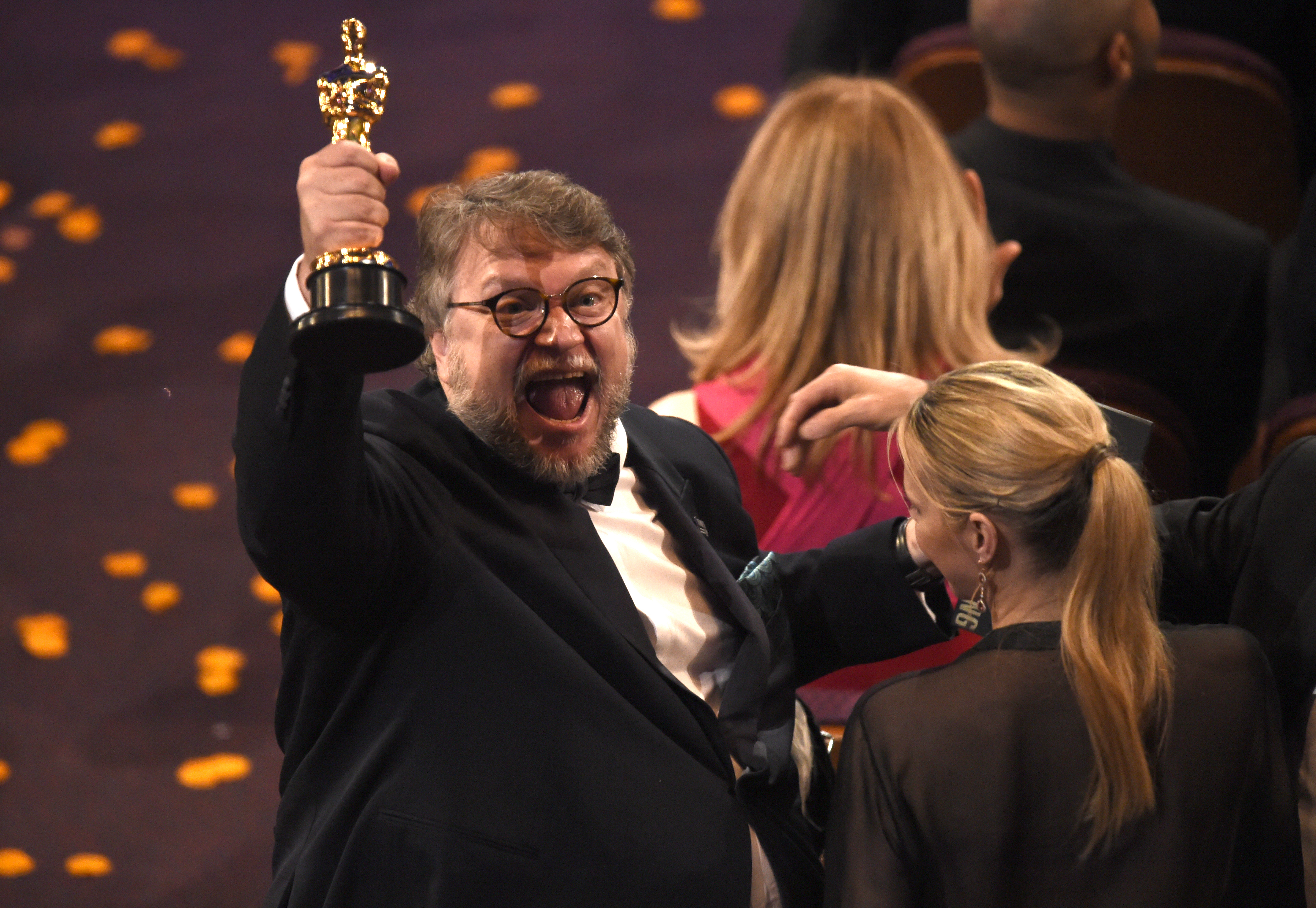 Shape Of Water's Guillermo Del Toro celebrates his best director win (Chris Pizzello/AP)