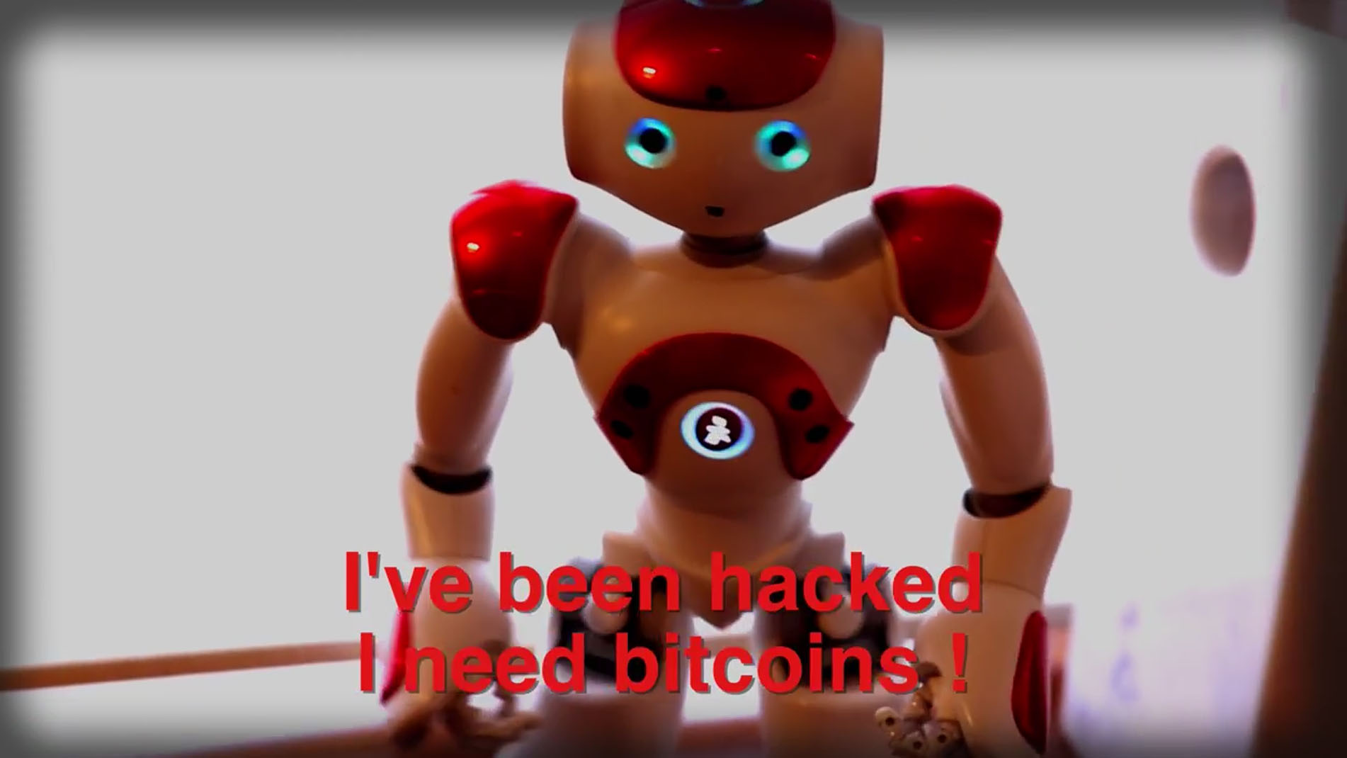 Hacked robot demanding bitcoins (IOActive)