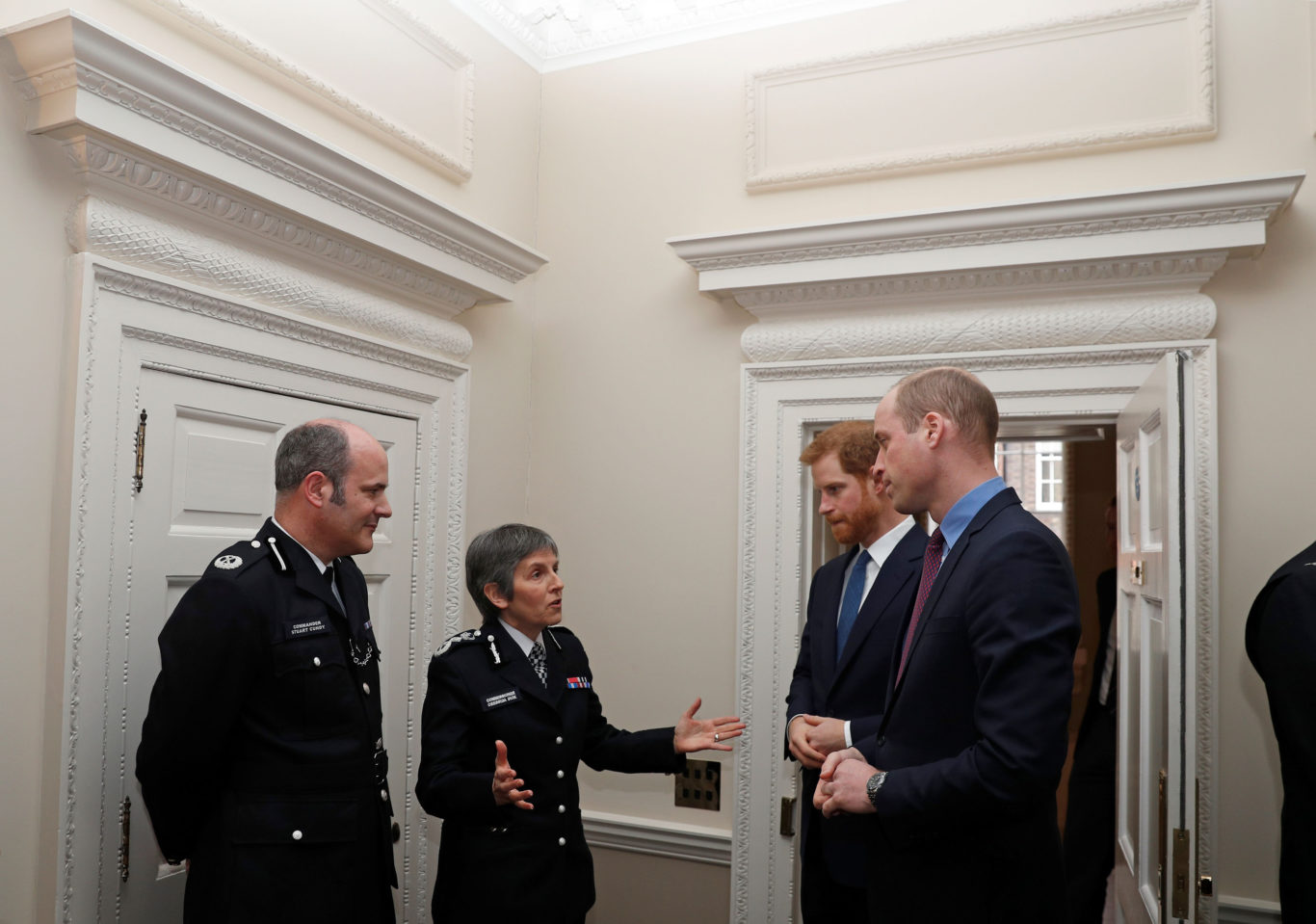 The Duke of Cambridge and Prince Harry chat to Ms Dick (Adrian Dennis/PA)