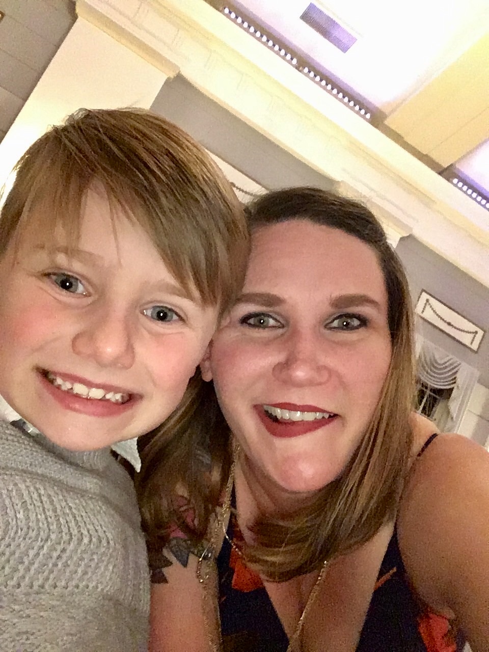 Tori Miller and her son Oliver, seven, (Tori Miller/PA)