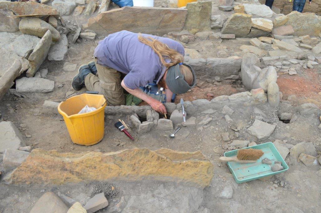 Work taking place at the large formal hearth (UHI/PA)