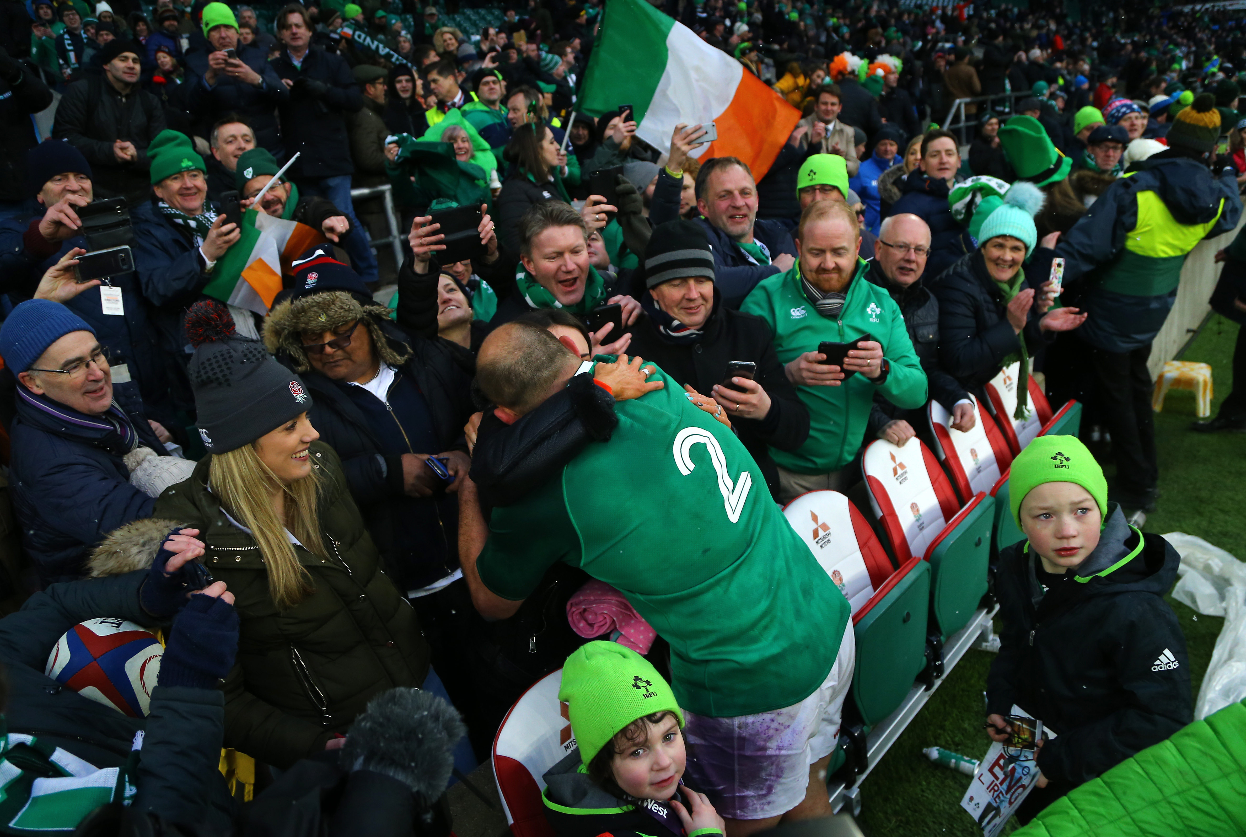 Ireland's Rory Best celebrates with family after winning the grand slam during the NatWest 6 Nations match at Twickenham Stadium, London