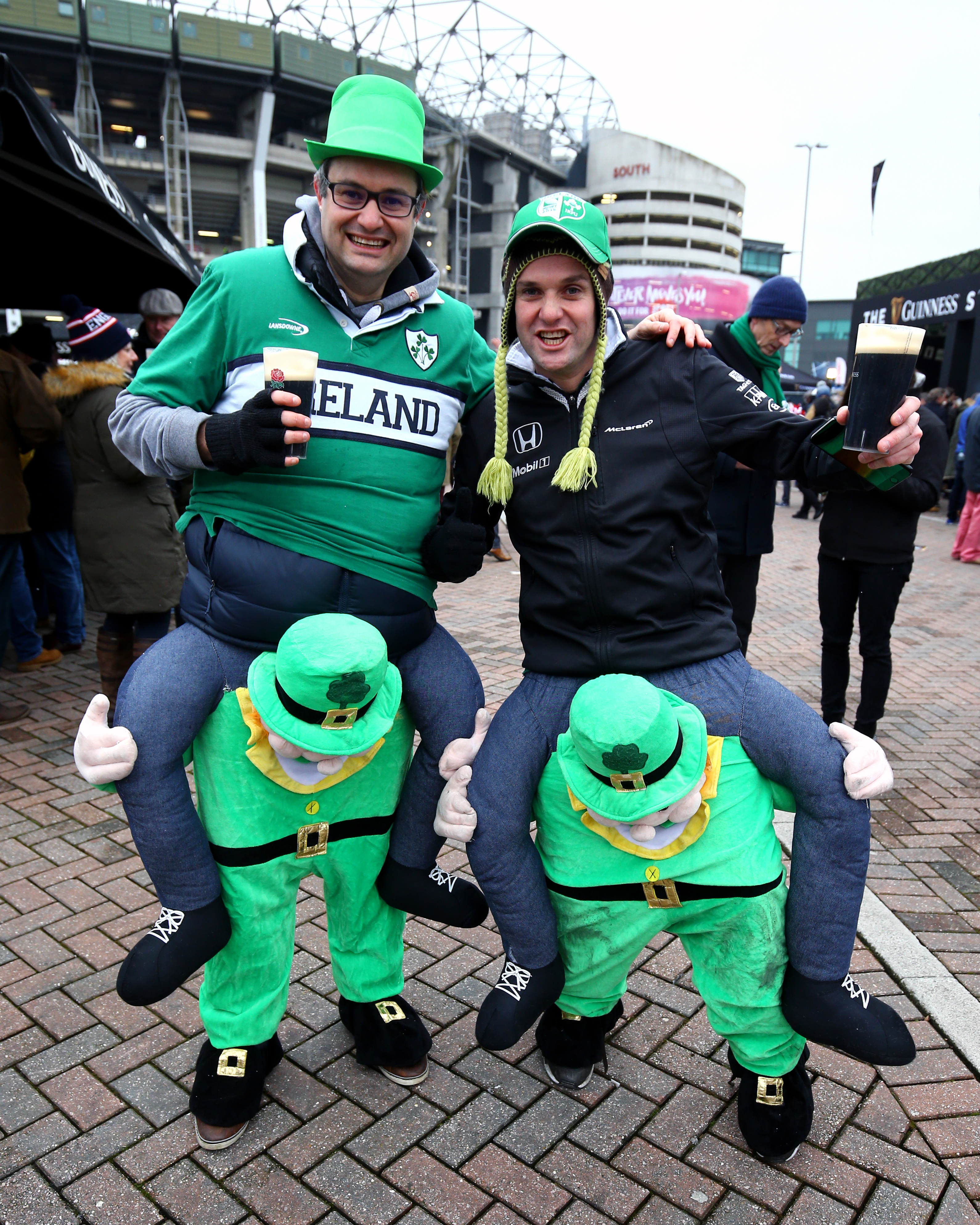 Ireland fans pose for a picture prior to the NatWest 6 Nations match at Twickenham Stadium, London