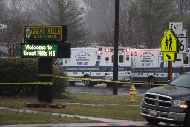 Deputies, federal agents and rescue personnel converge on Great Mills High School (Alex Brandon/AP)