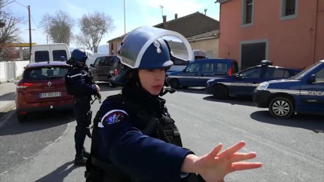 Police attend the incident in Trebes (La Depeche Du Midi via AP)