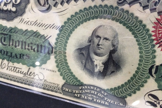 A depiction of Declaration of Independence signer Robert Morris is seen on the front of an 1863 1,000 dollar bill (Courtney Columbus/AP)