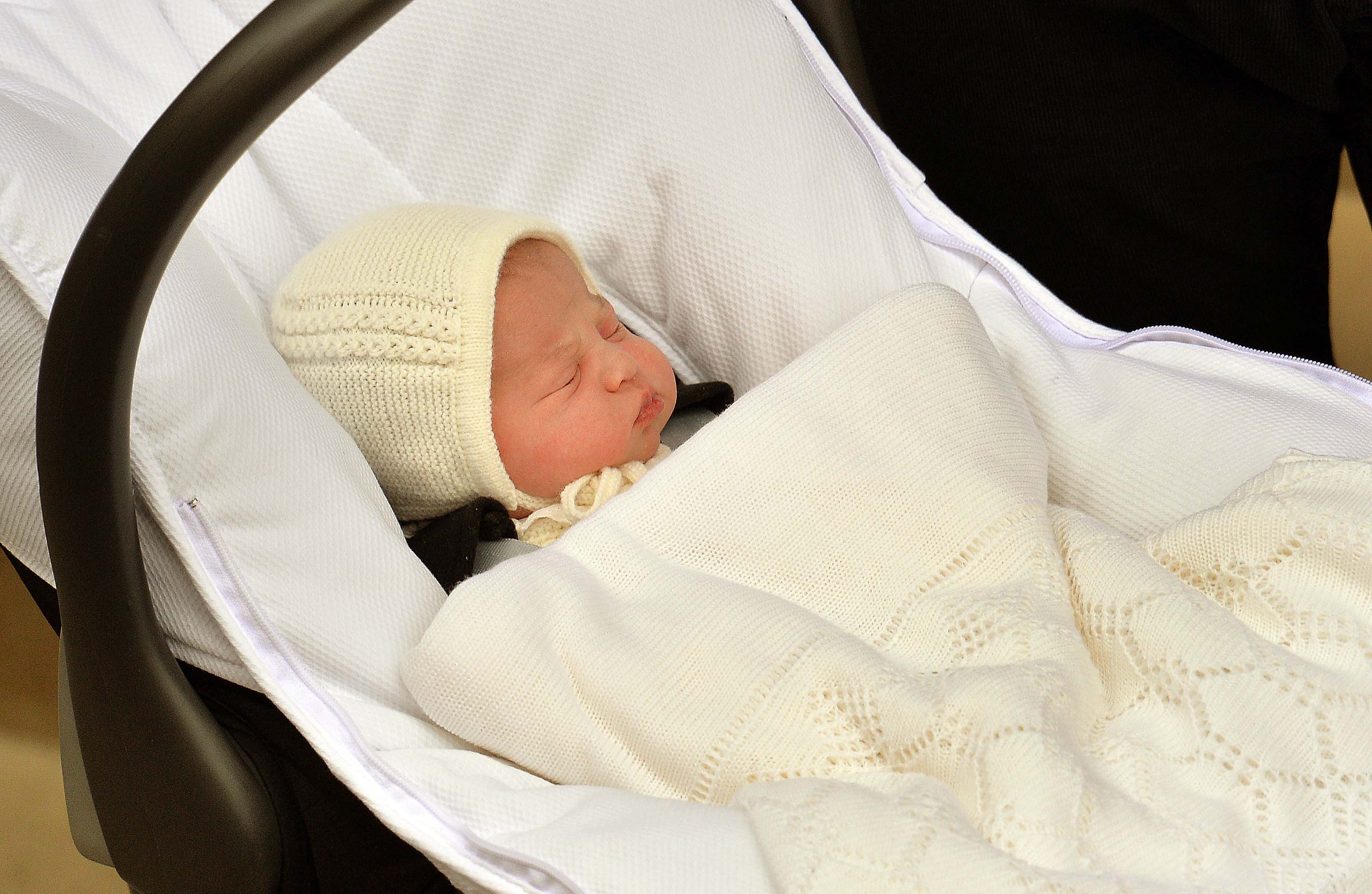 Princess Charlotte in her baby car seat outside the Lindo Wing (John Stillwell/PA)