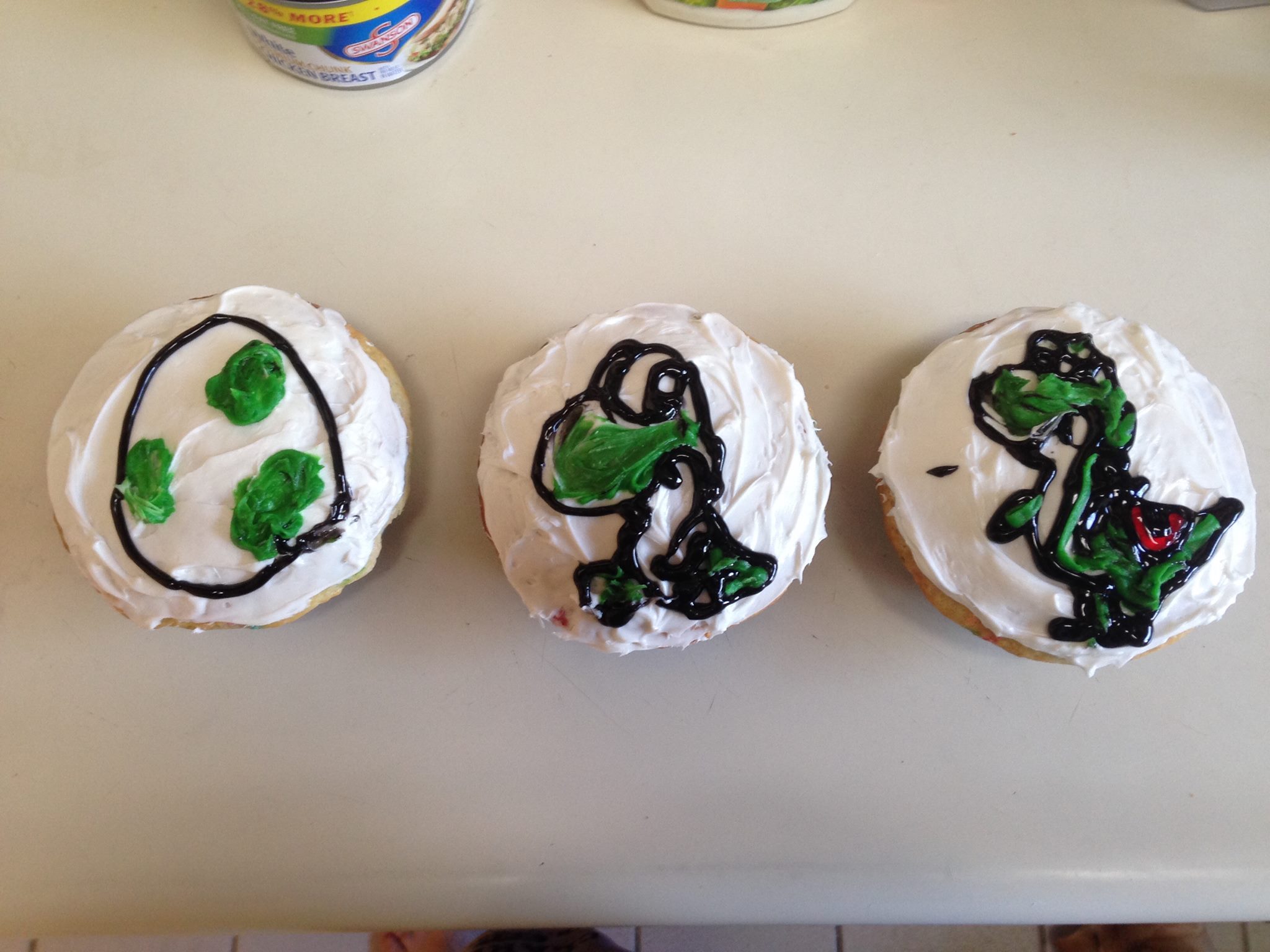 Three home-made Yoshi cakes