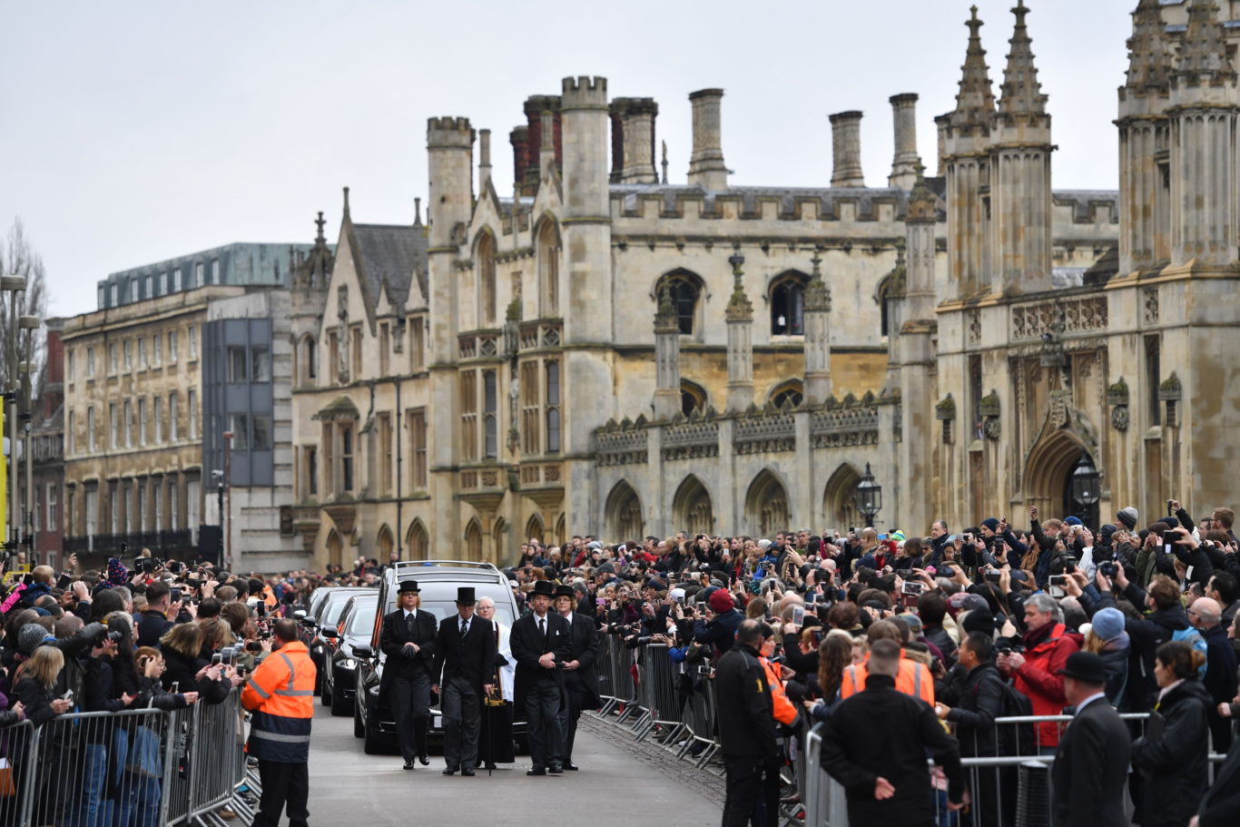 Crowds watch as the funeral cortege arrives (Joe Giddens/PA)