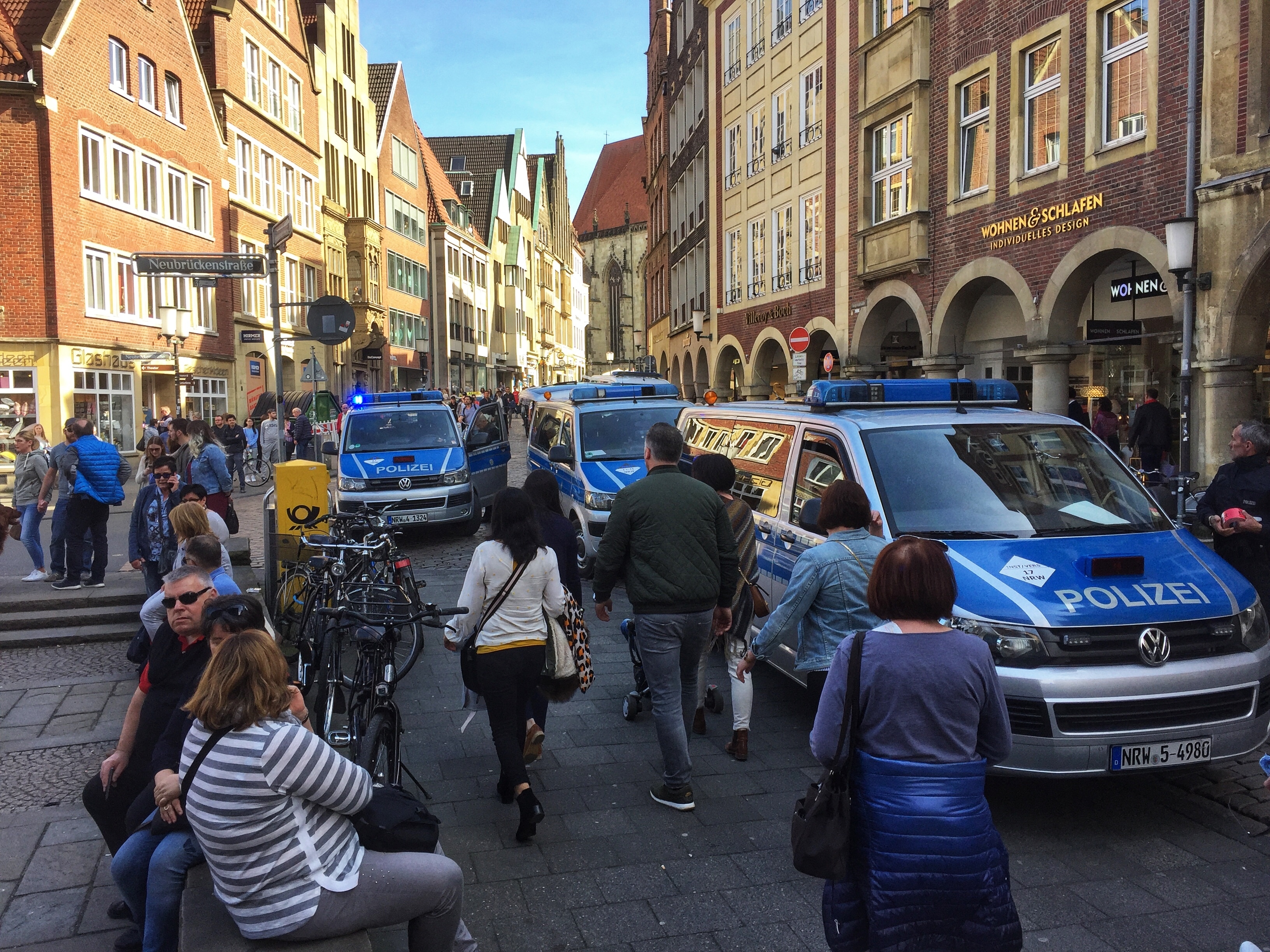 Police vans in Munster (dpa via AP)