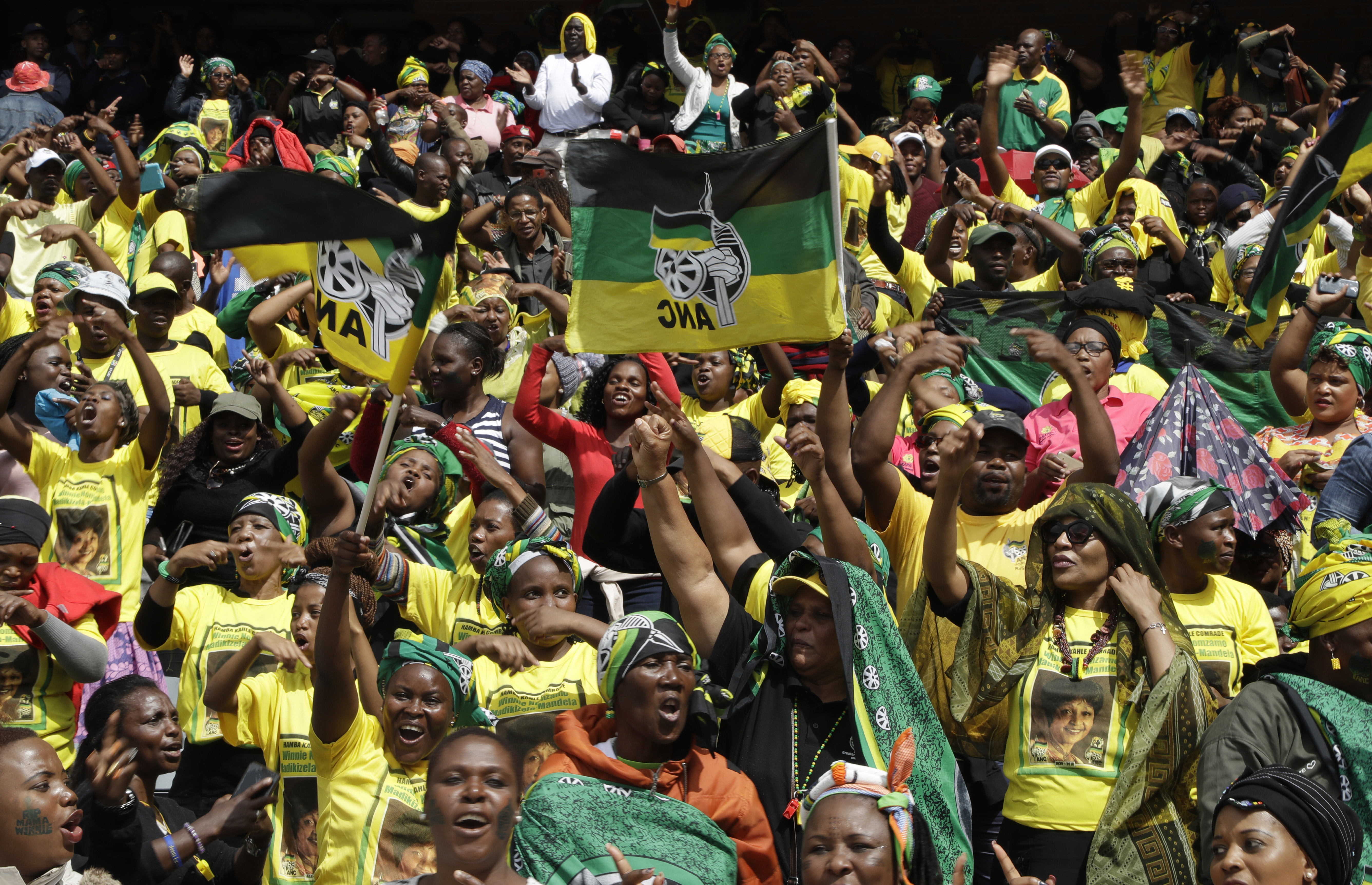 Mourners attend the memorial service (Themba Hadebe/AP)