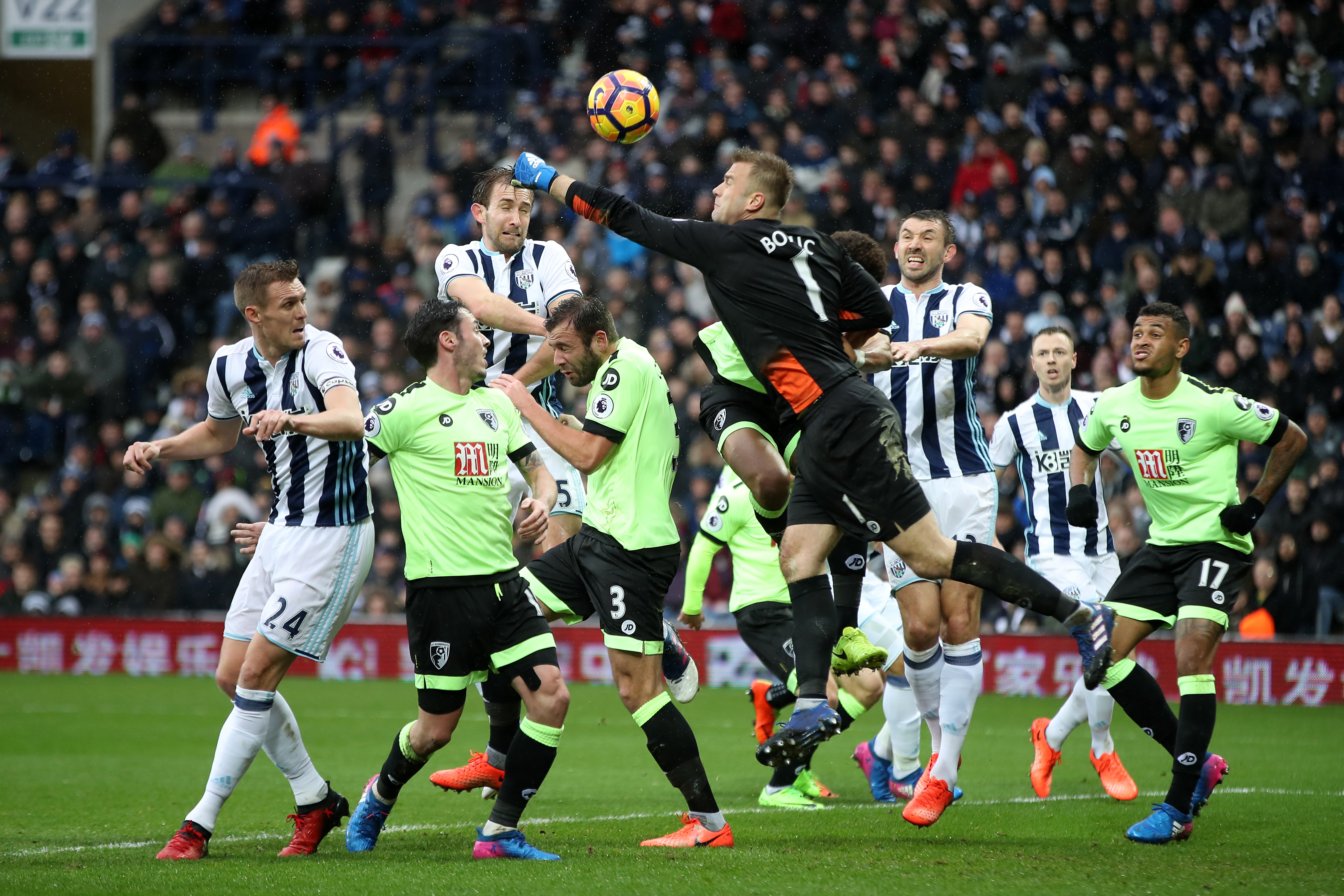 Bournemouth goalkeeper Artur Boruc goes to punch the ball