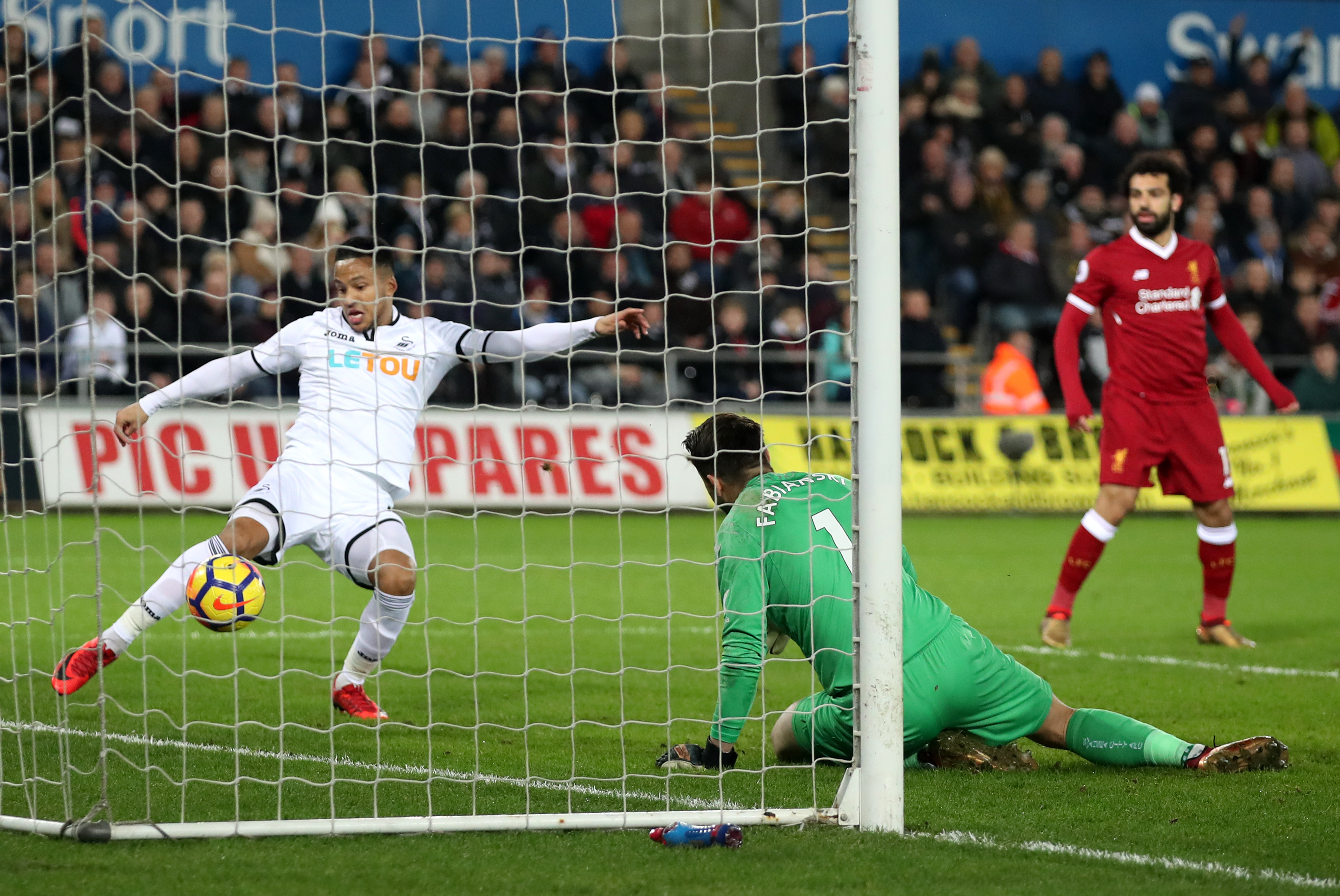 The ball is cleared off the line at the Liberty Stadium