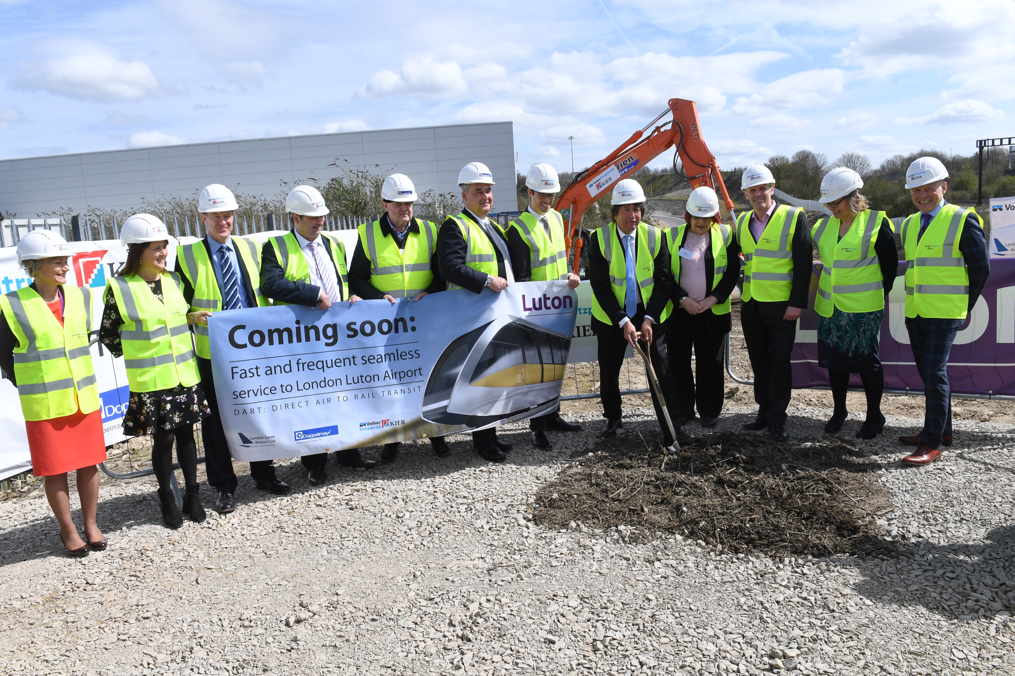 Council officials join contractors at the start of work on the light railway (London Luton Airport/PA)