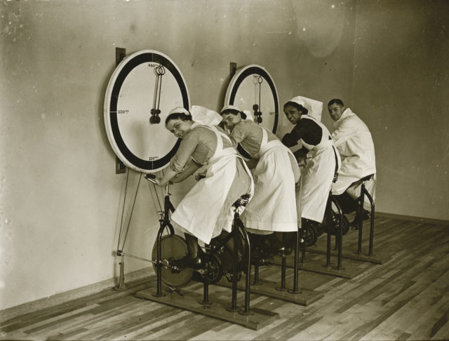 Nurses try out exercise bikes at a gym in the new Albert Dock Hospital (Historic England Archive/PA)