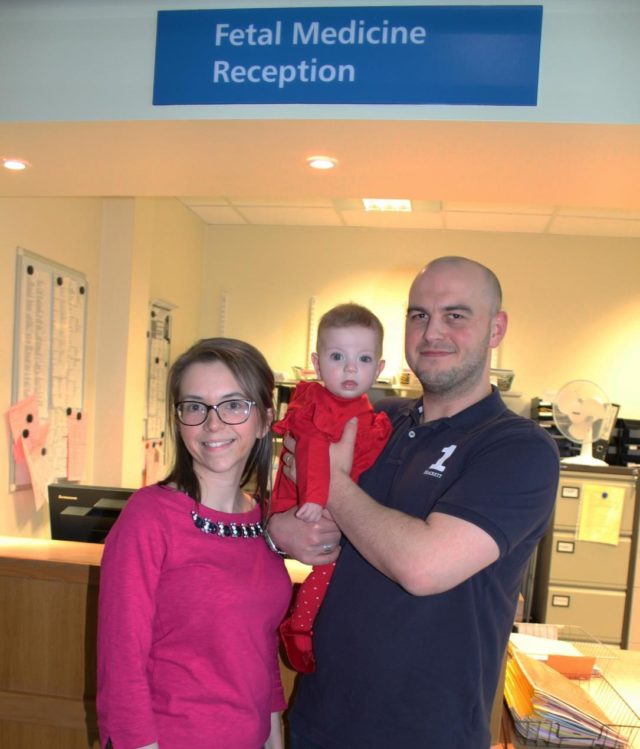 Baby Harriet Elder whose life was savedby surgery in her mother's womb, with her parents Ruth and Ross (Newcastle upon Tyne Hospitals NHS Foundation Trust/PA)