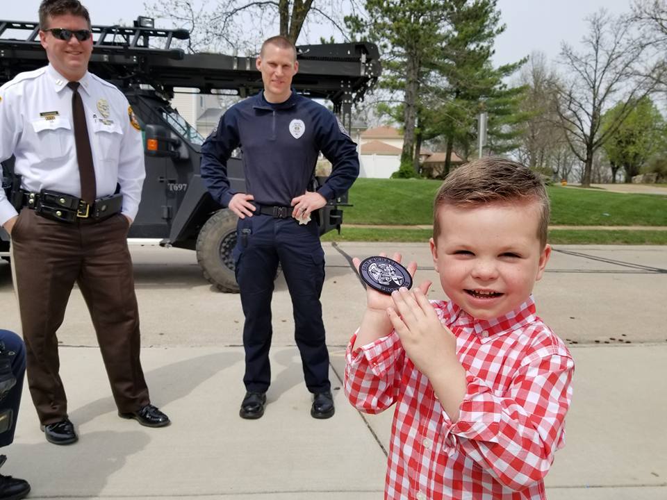 Auggie with his badge