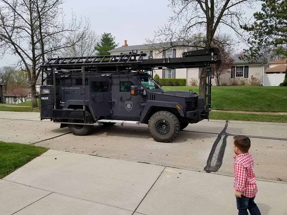 Auggie with armoured vehicle