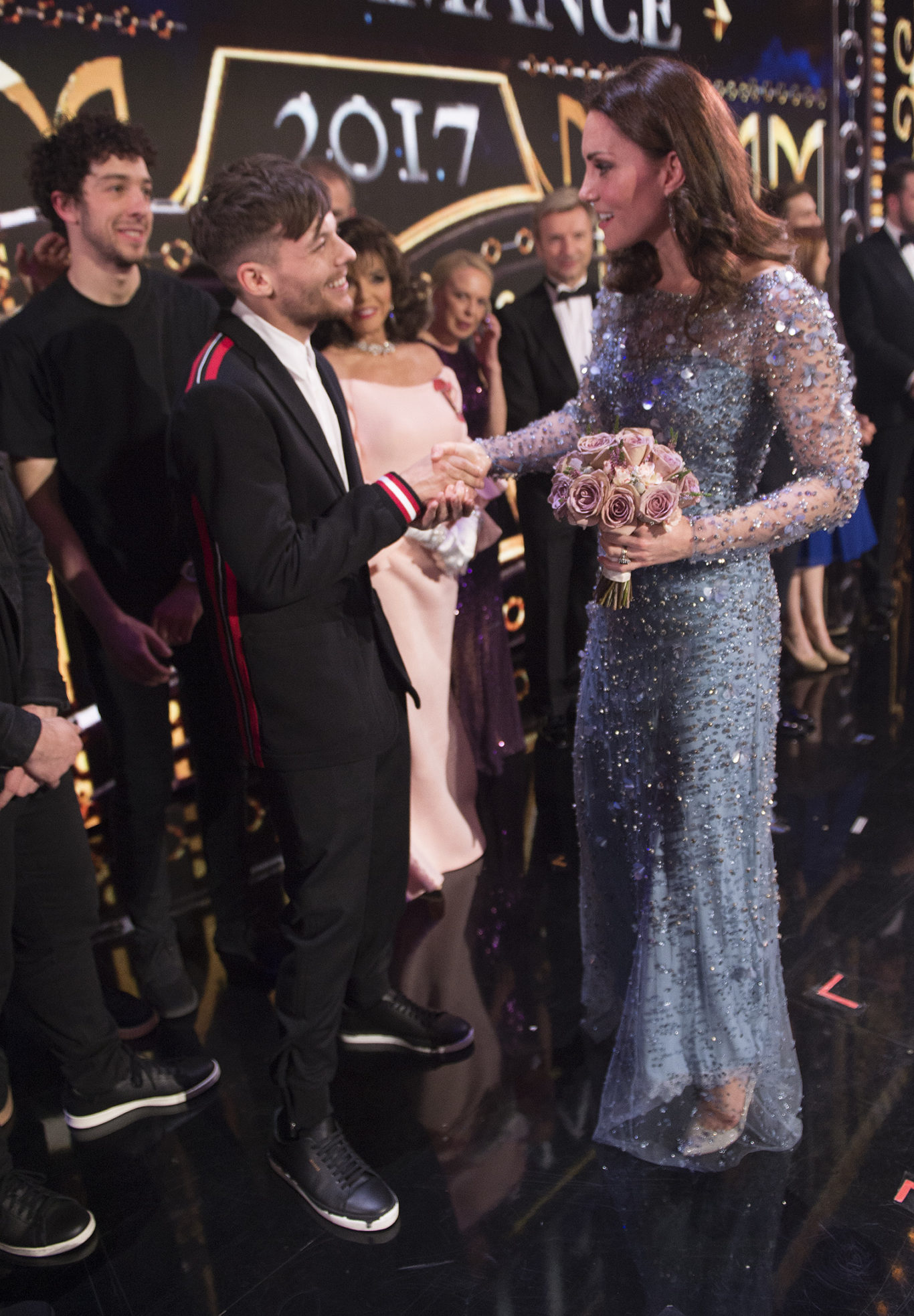 Louis Tomlinson and the Duchess of Cambridge at the Royal Variety Performance