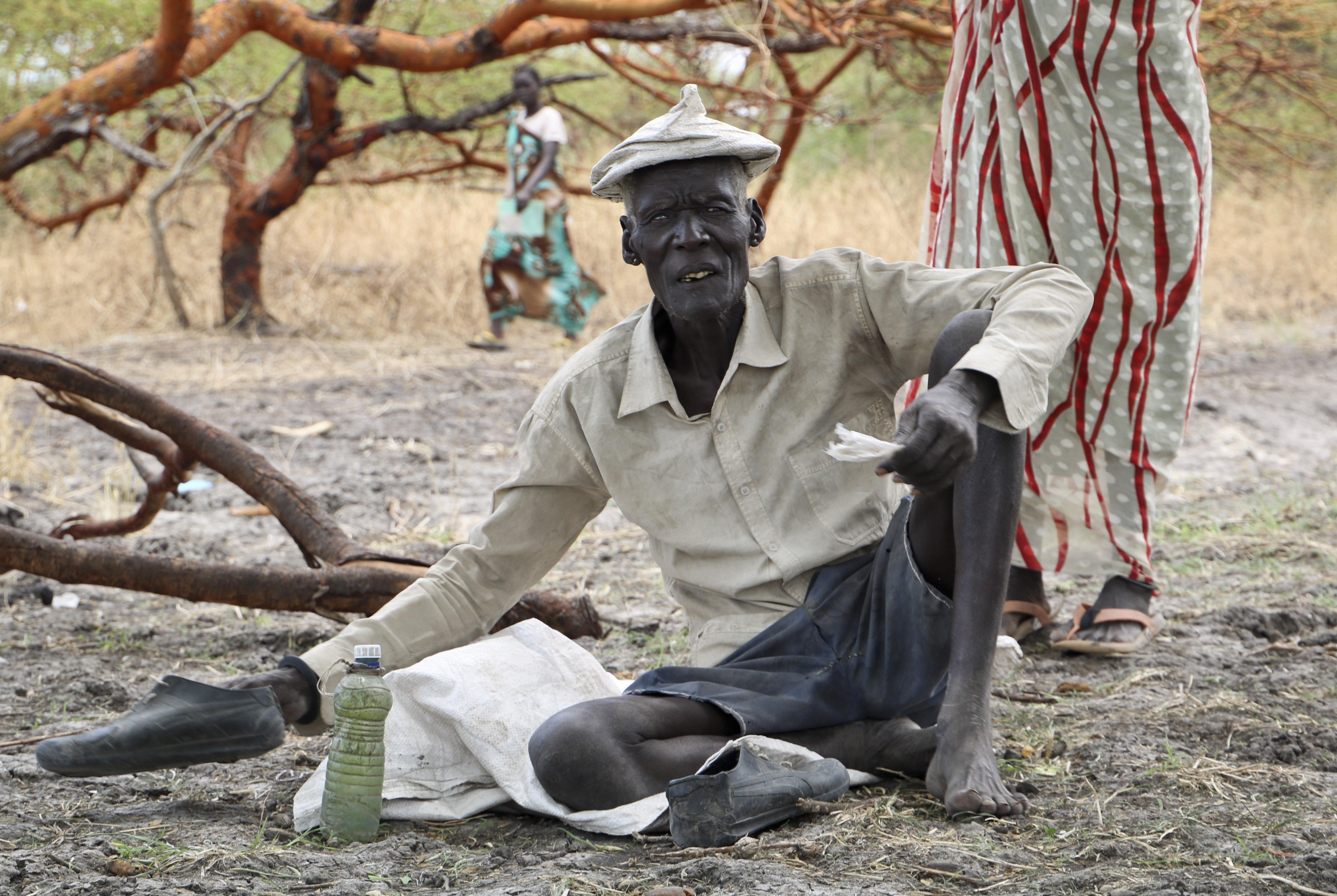 Gatdin Bol, 65, who fled fighting and now survives by eating fruit from the trees (Sam Mednick/AP)