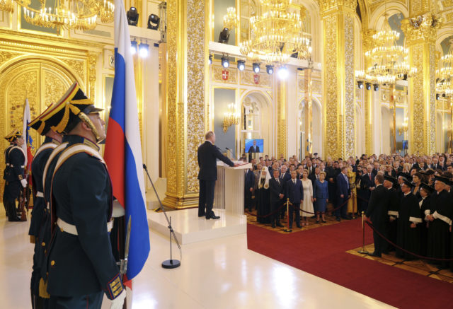 Vladimir Putin speaks in the Grand Kremlin Palace