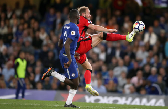 Huddersfield Town's Laurent Depoitre scores Huddersfield's goal in their 1-1 draw at Chelsea that keeps them in the Premier League