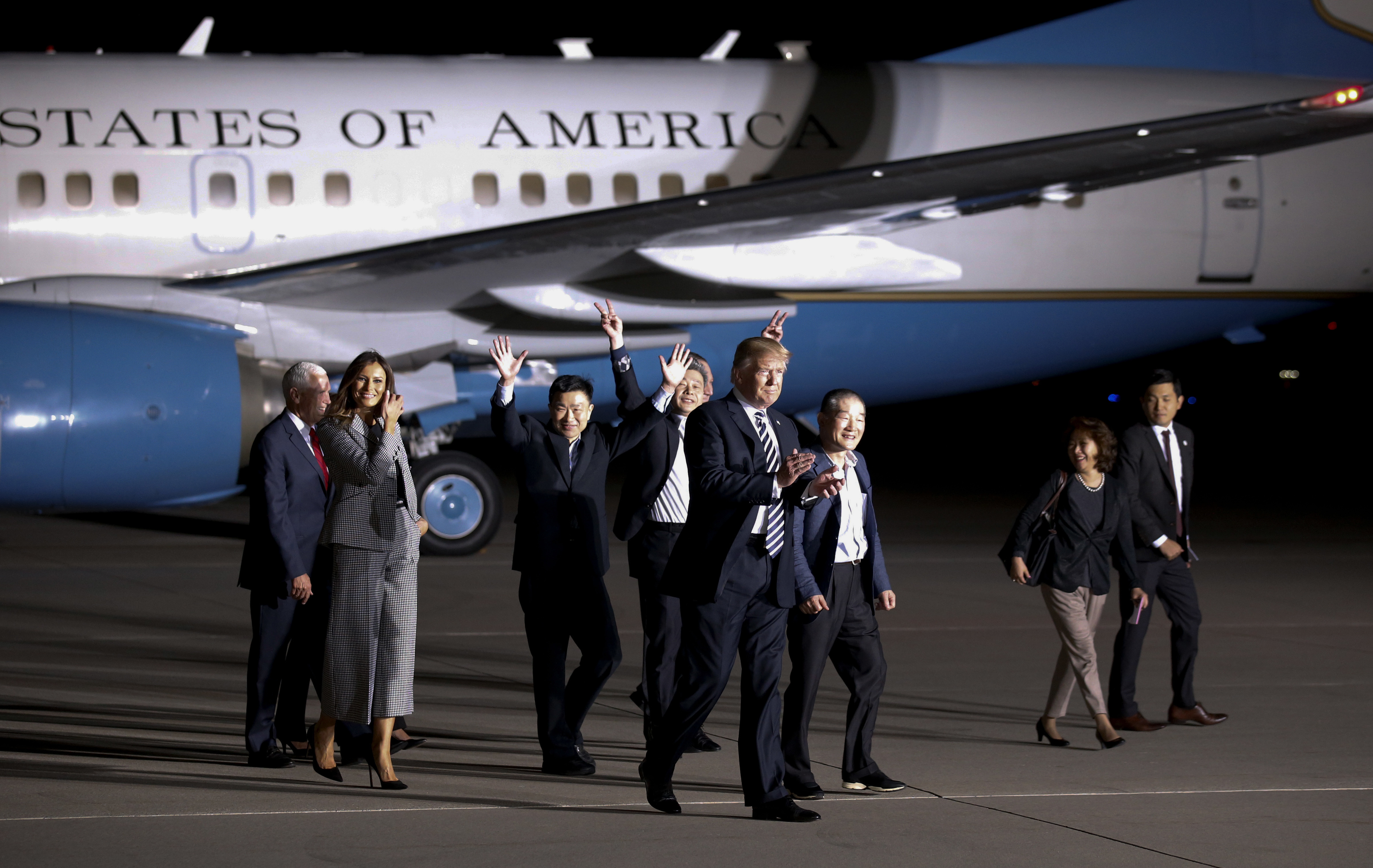 Donald and Melania Trump walk with former North Korean detainees Tony Kim, third from left, Kim Hak Song and Kim Dong Chul (Alex Brandon/AP)
