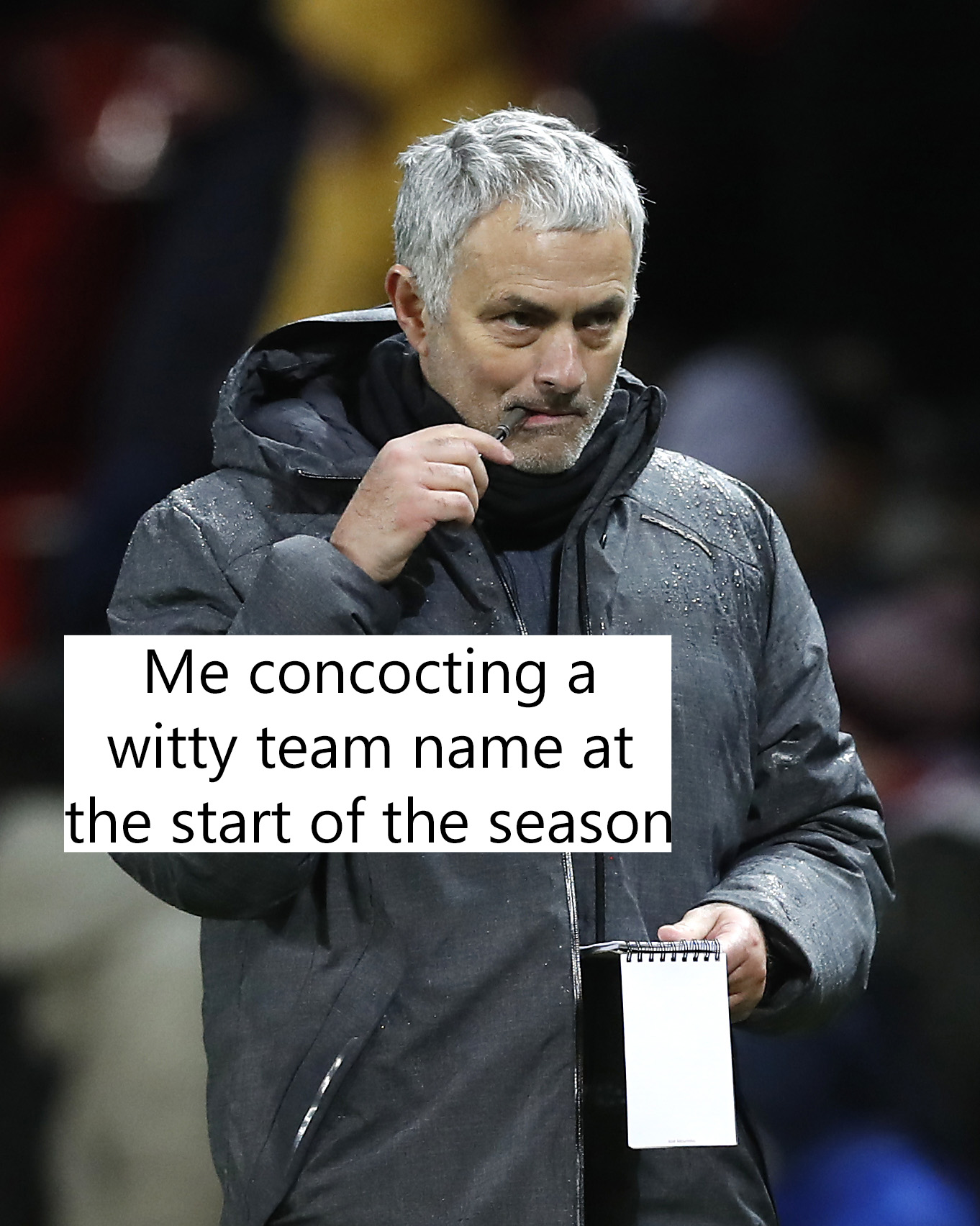 Mourinho with a notepad