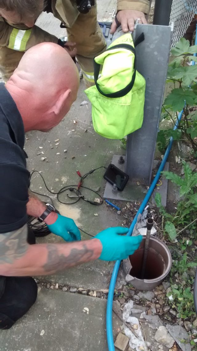 Chimney sweep David O'Donnell used his poles to help rescue two kittens trapped in a sewage pipe in Grays, Essex. (RSPCA/ PA)