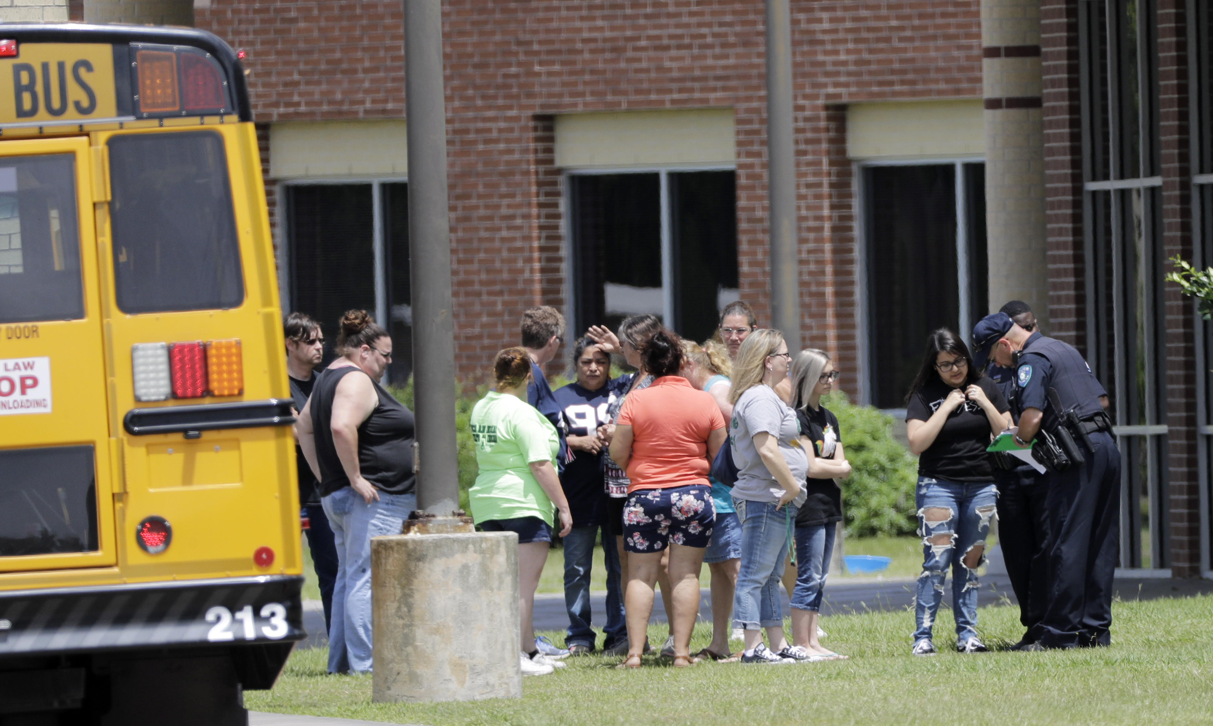 Students are checked before entering Santa Fe High School David J Phillip/PA)