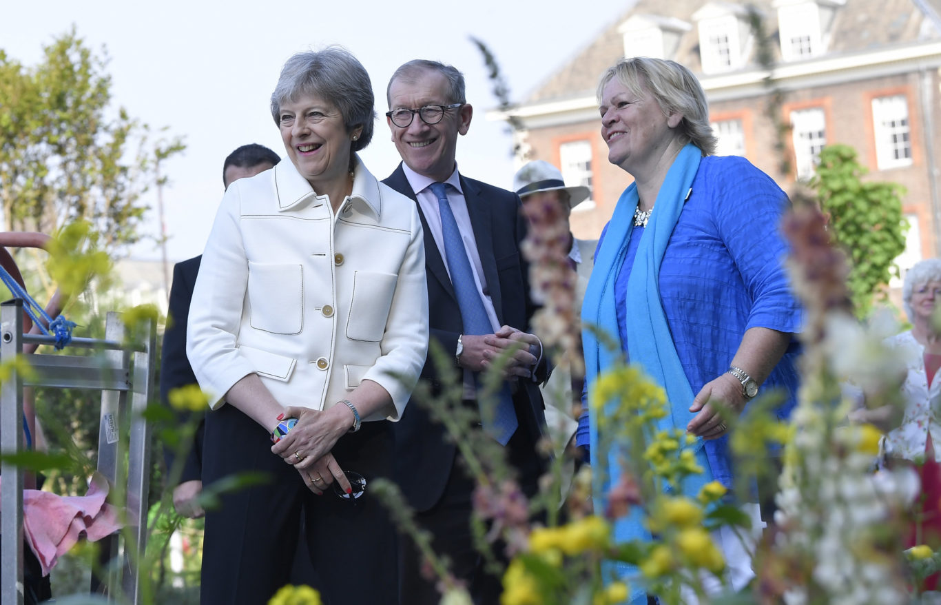 Prime Minister Theresa May, accompanied by her husband Philip (Jonathan Brady/PA)