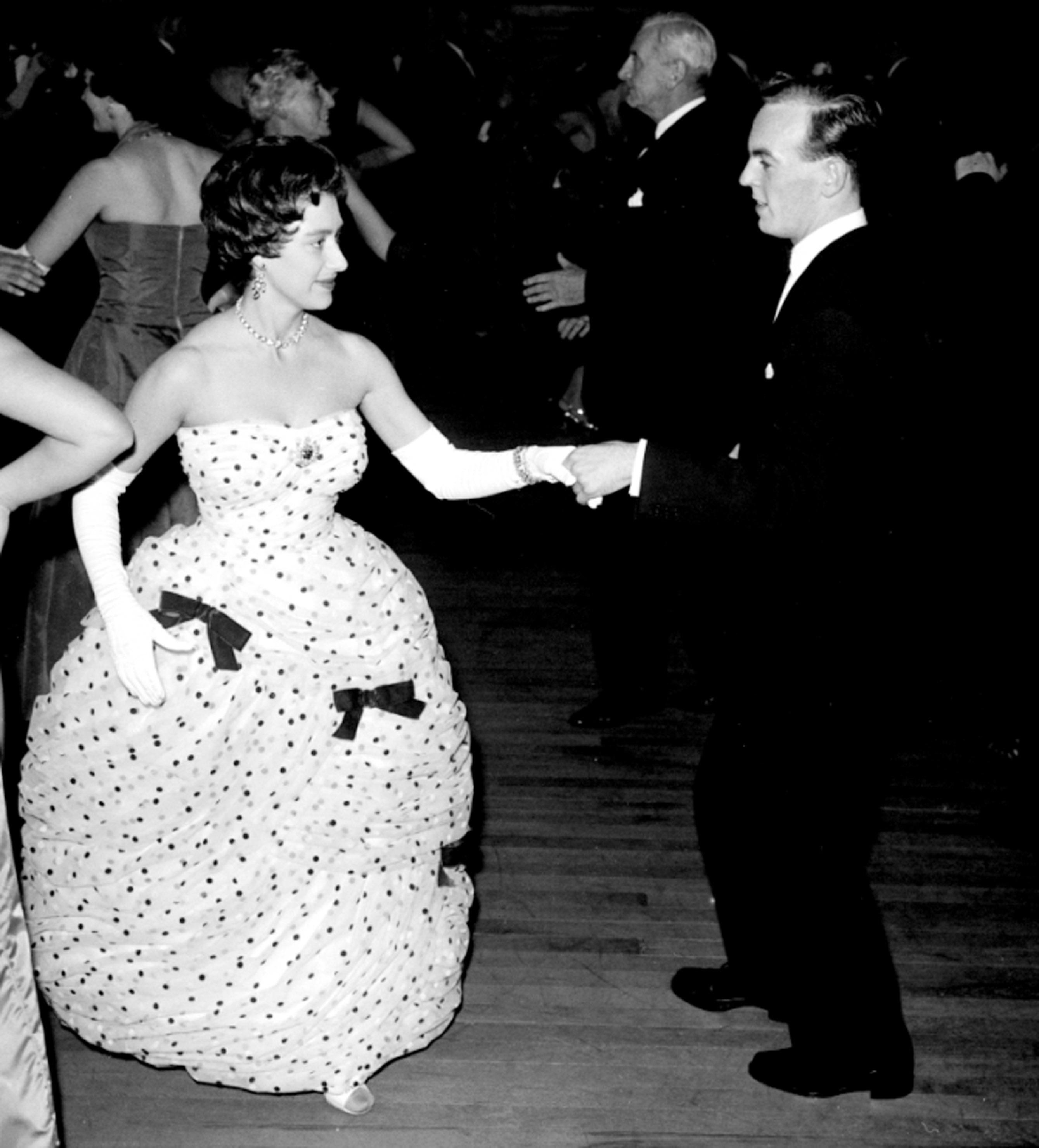 Princess Margaret dances at a ball in 1958