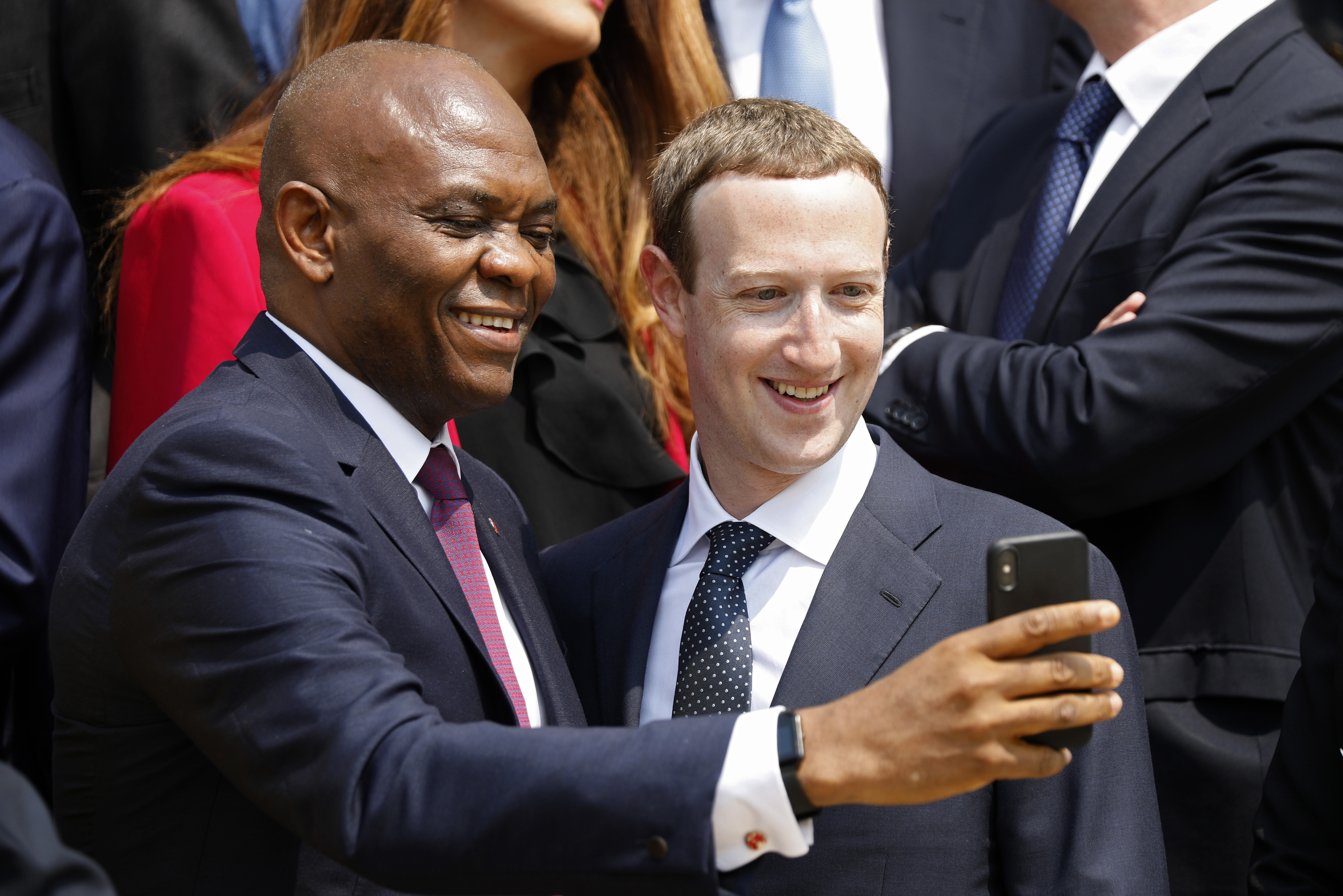 Mark Zuckerberg takes a selfie with Tony Elumelu, chairman of United Bank of Africa (Charles Platiau,Pool via AP)