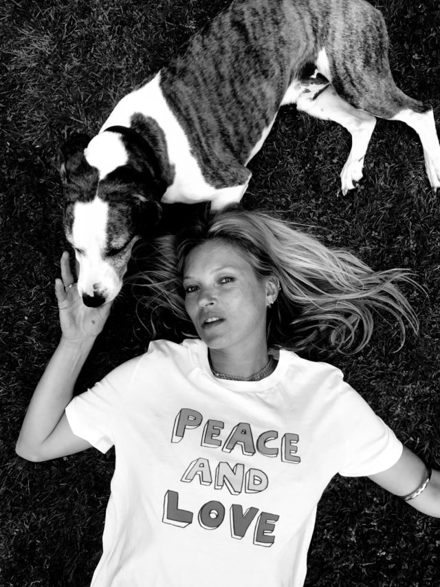 Model Kate Moss wearing a t-shirt with a Bella Freud print for a War Child initiative. 