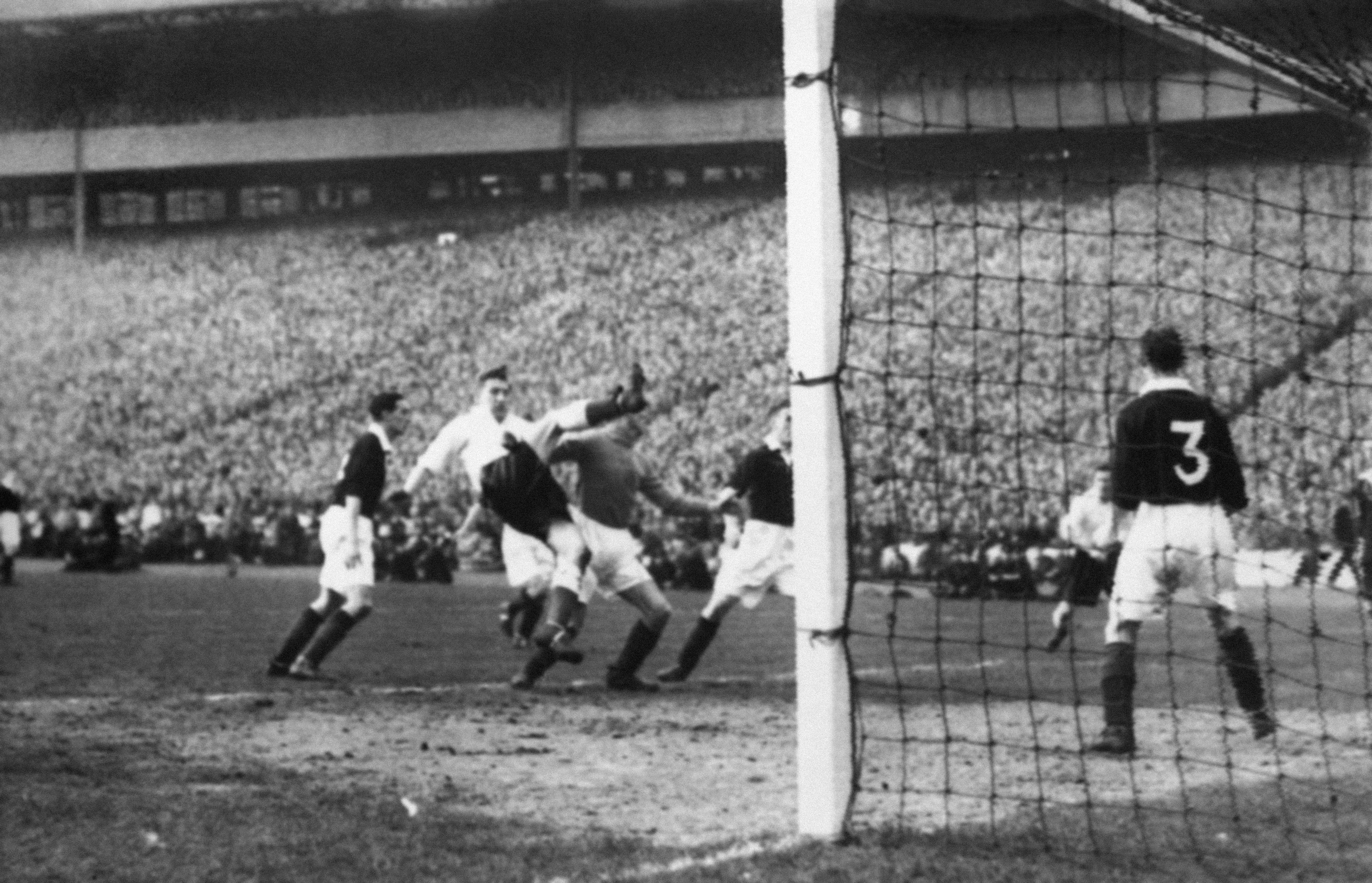 Scotland and England compete against one another at the 1949/50 British Home Championship