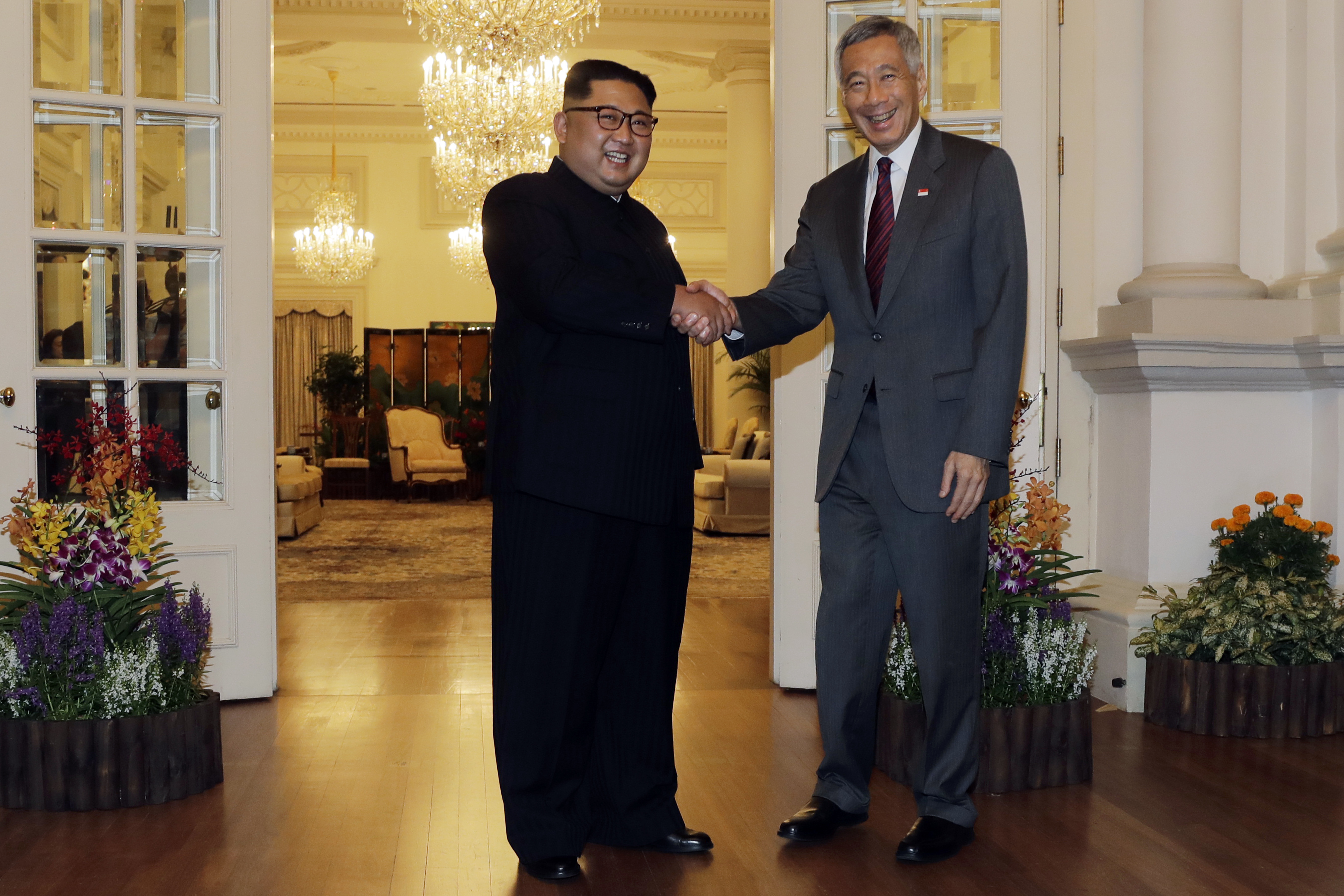 North Korean leader Kim Jong Un meets Singapore's Prime Minister Lee Hsien Loong