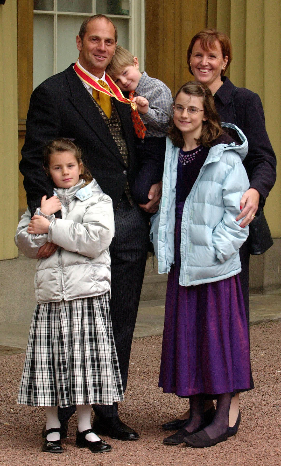 Sir Steven Redgrave with his wife, Lady Redgrave, son Zak, 3 and daughters Sophie, 7, left and Natalie, 9, at Buckingham Palace, London, Tuesday 1st May, 2001, after the 5 times Olympic gold medallist, received a Knight Batchelor from Britain's Queen Elizabeth II. in 2001 (Fiona Hanson/PA)