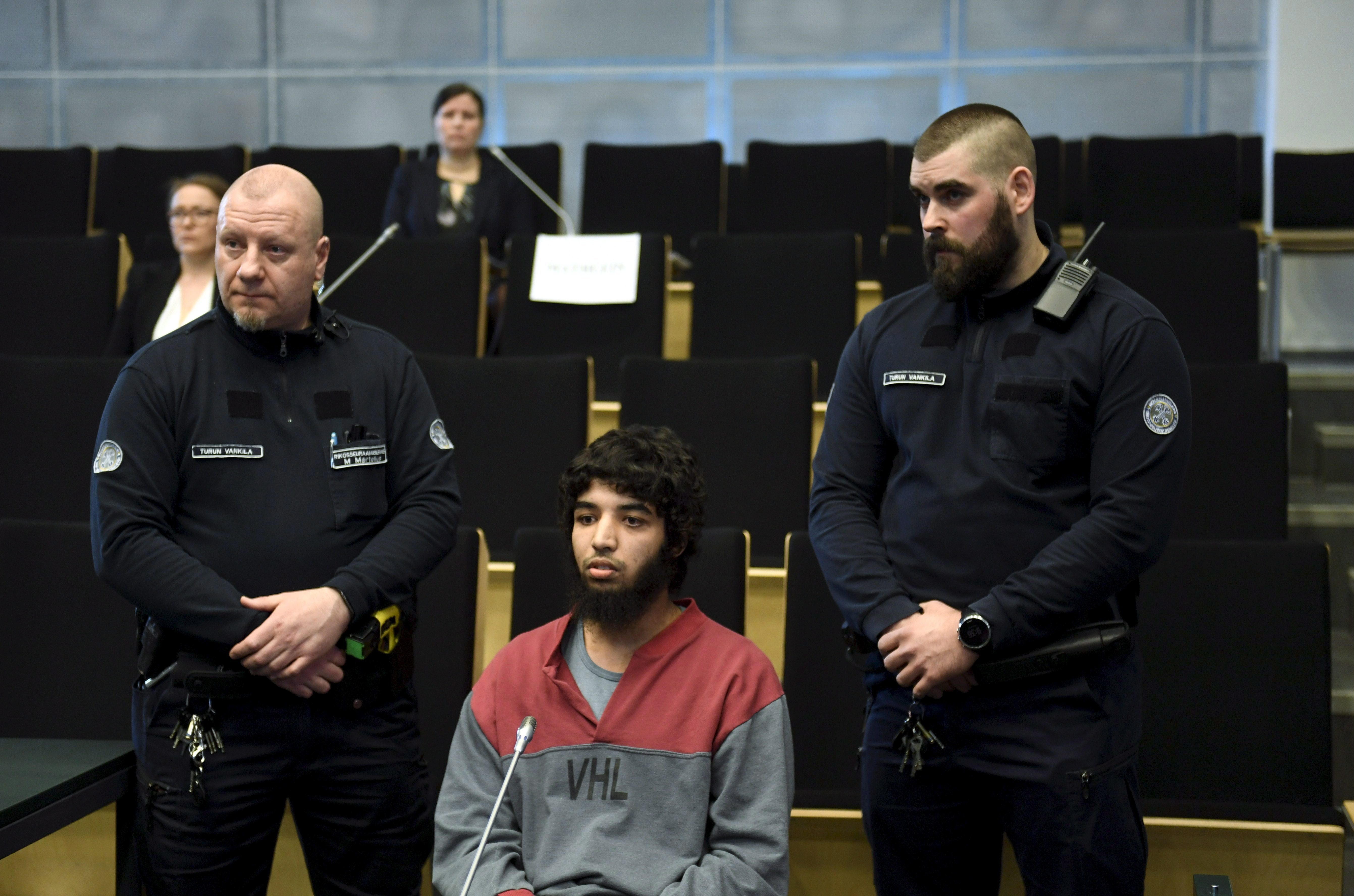 Abderrahman Bouanane attends his trial in prison in Turku, Finland