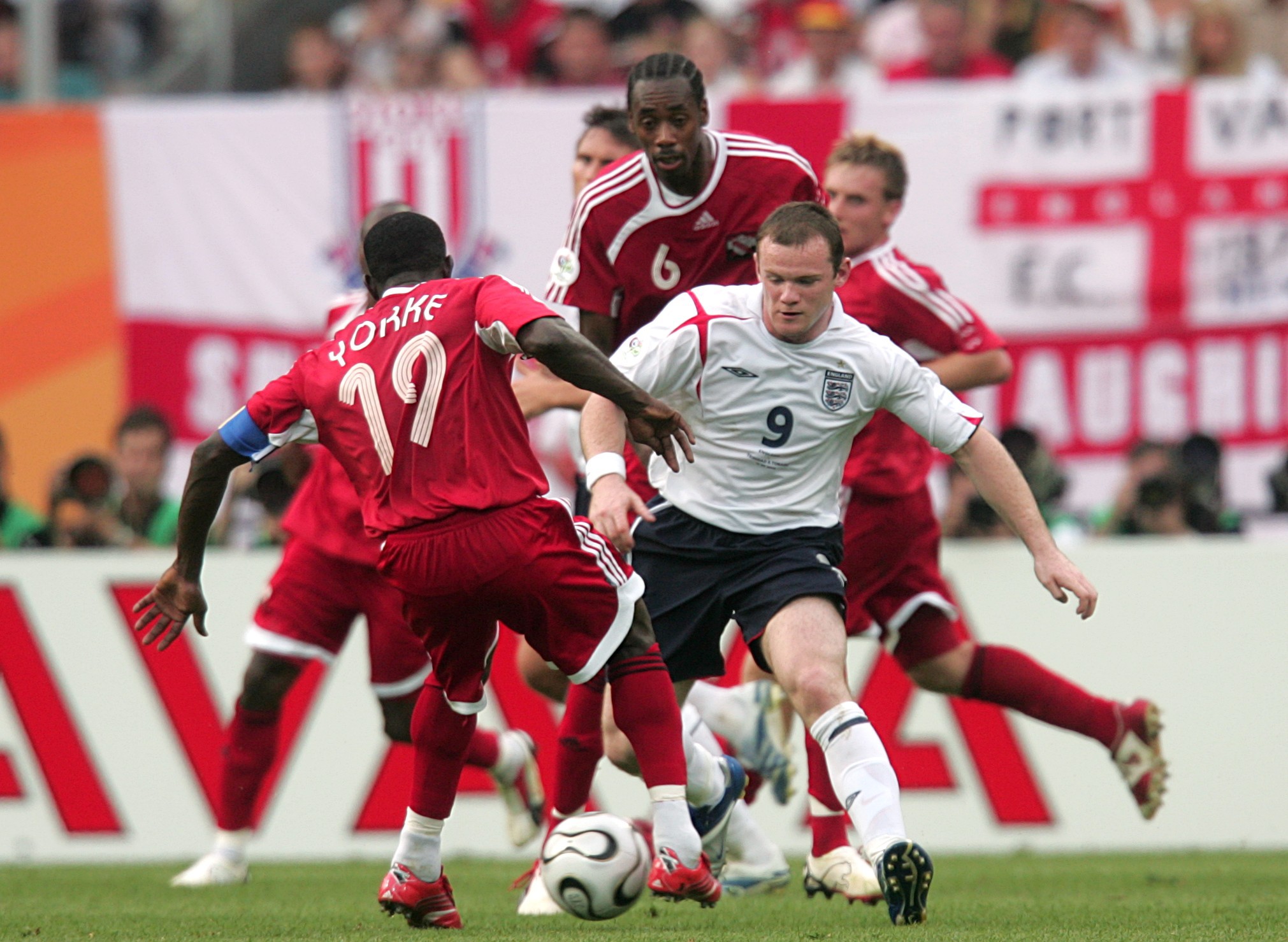 Wayne Rooney and Dwight Yorke go head to head