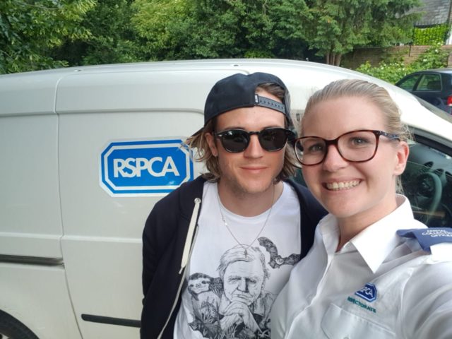 McFly bassist Dougie Poynter with Animal Collection Officer Miller. 