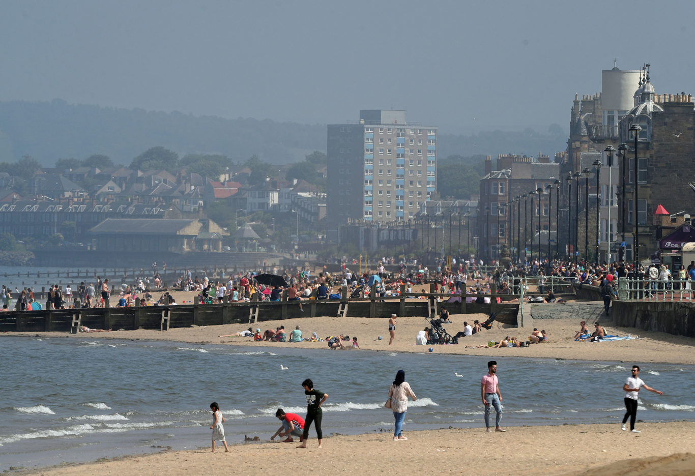 Sunseekers made the most of the weather in Edinburgh (Andrew Milligan/PA)