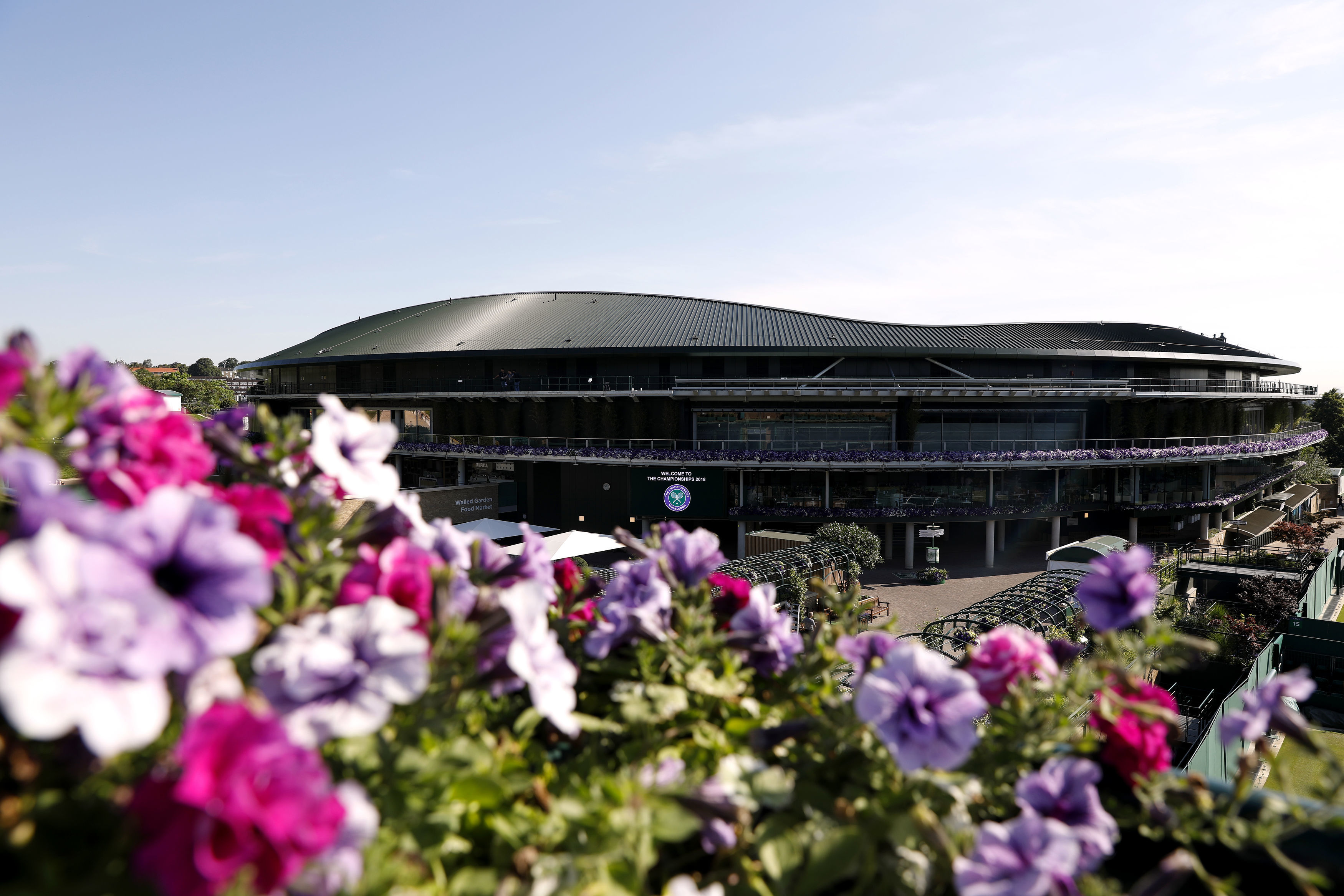 General view across the grounds towards court one on day one of the Wimbledon Championships at the All England Lawn Tennis and Croquet Club
