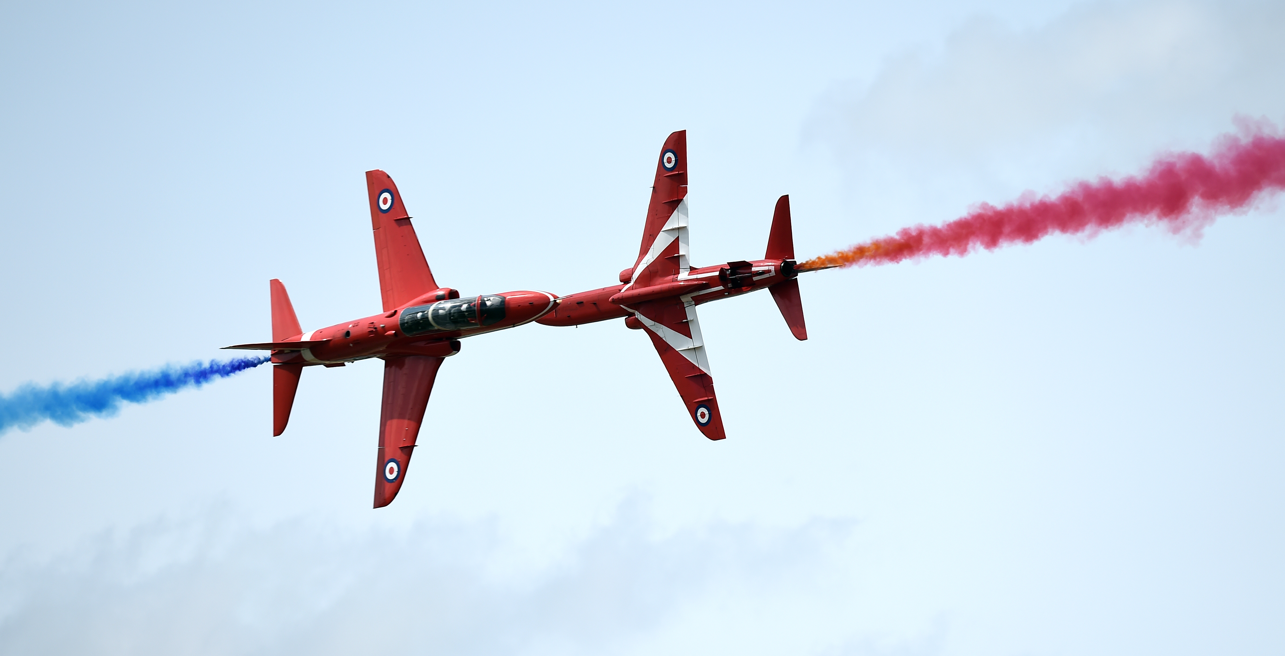 The Red Arrows perform a display at the Royal International Air Tattoo at RAF Fairford, Gloucestershire