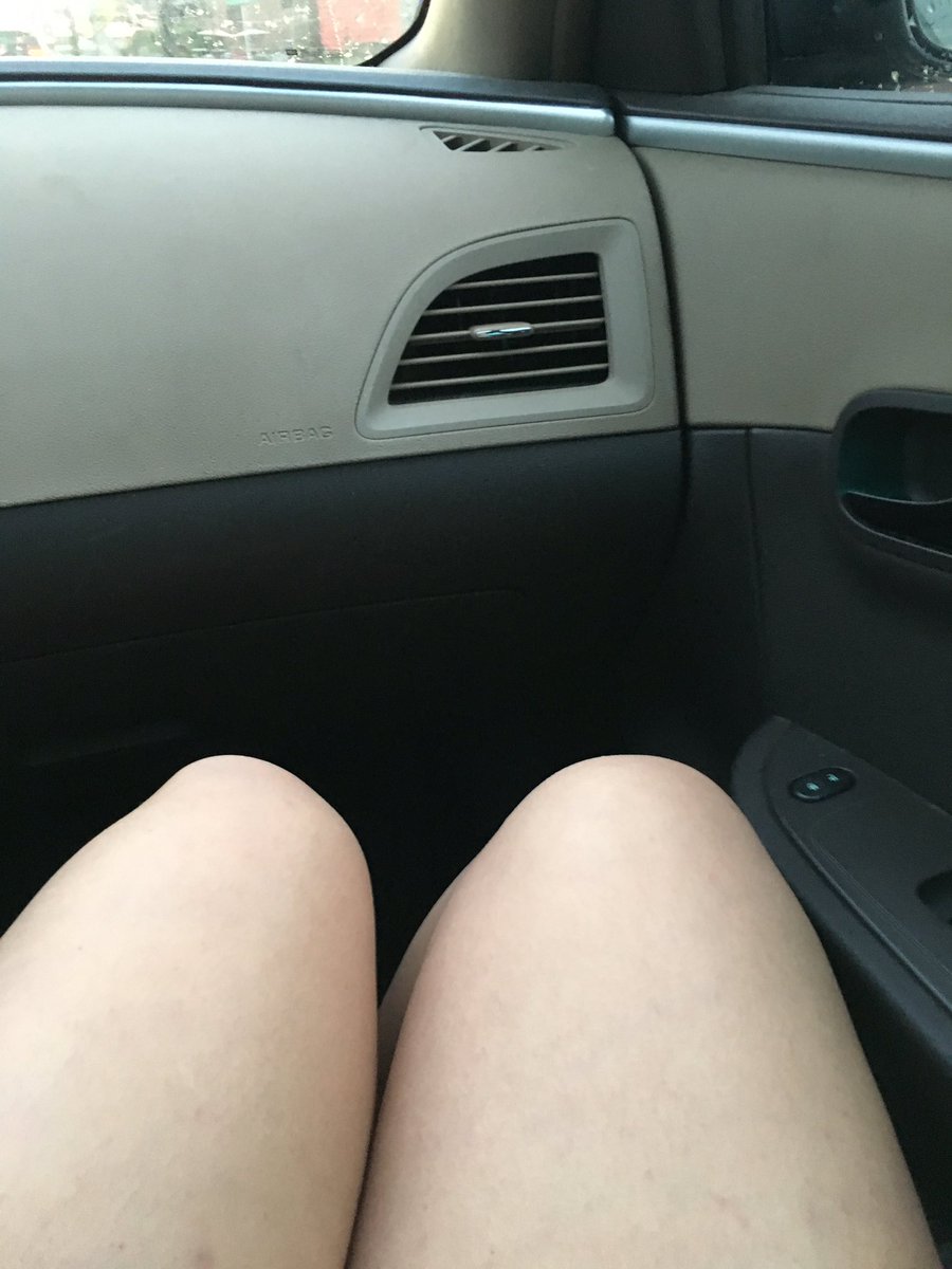 Legs towards the door of the car