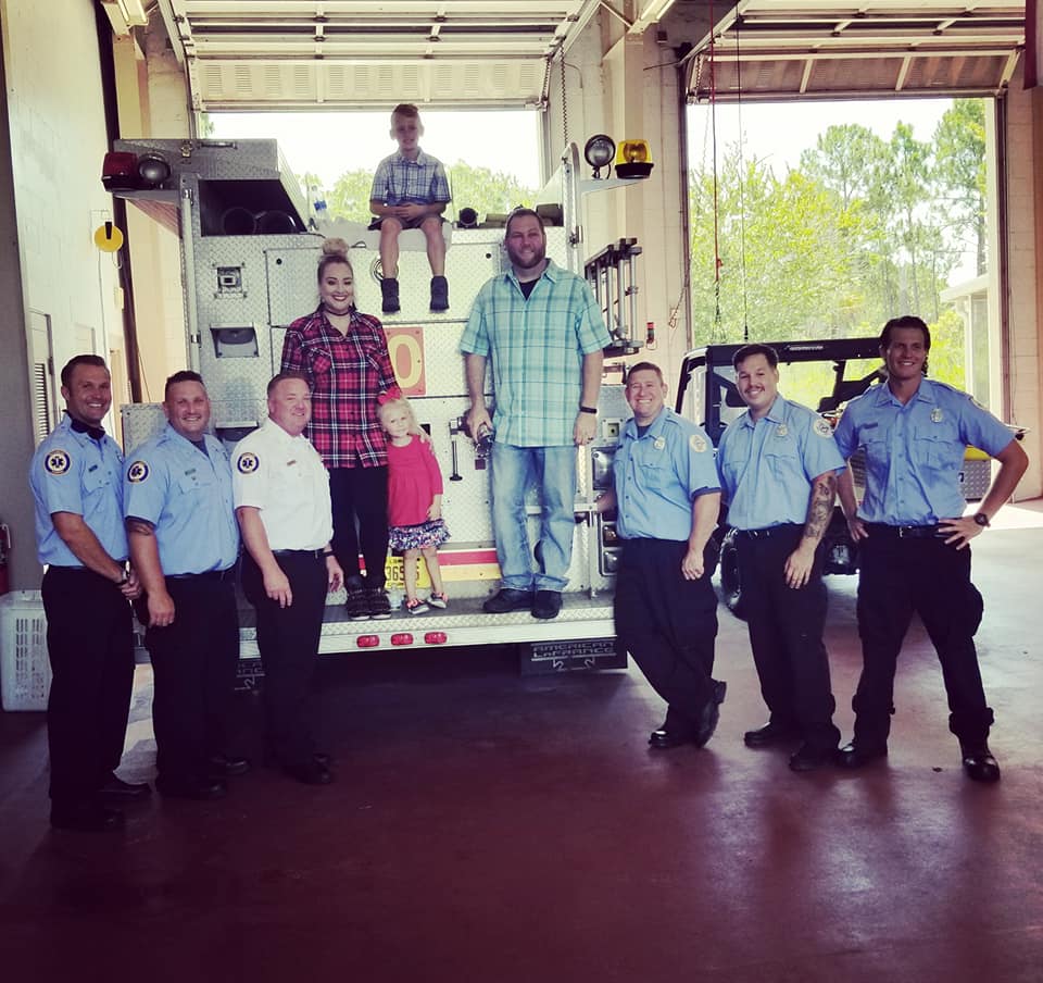 The family with the emergency workers