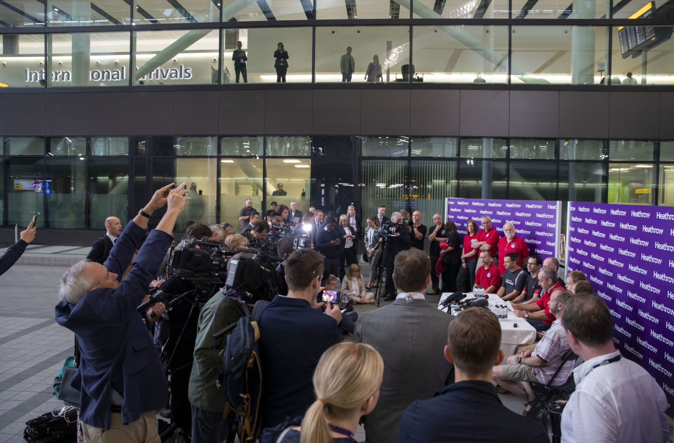 Divers from the rescue mission, who helped to save 12 schoolboys and their football coach from a flooded cave in Thailand, speak to media after arriving back at London's Heathrow Airport (Steve Parsons/PA)