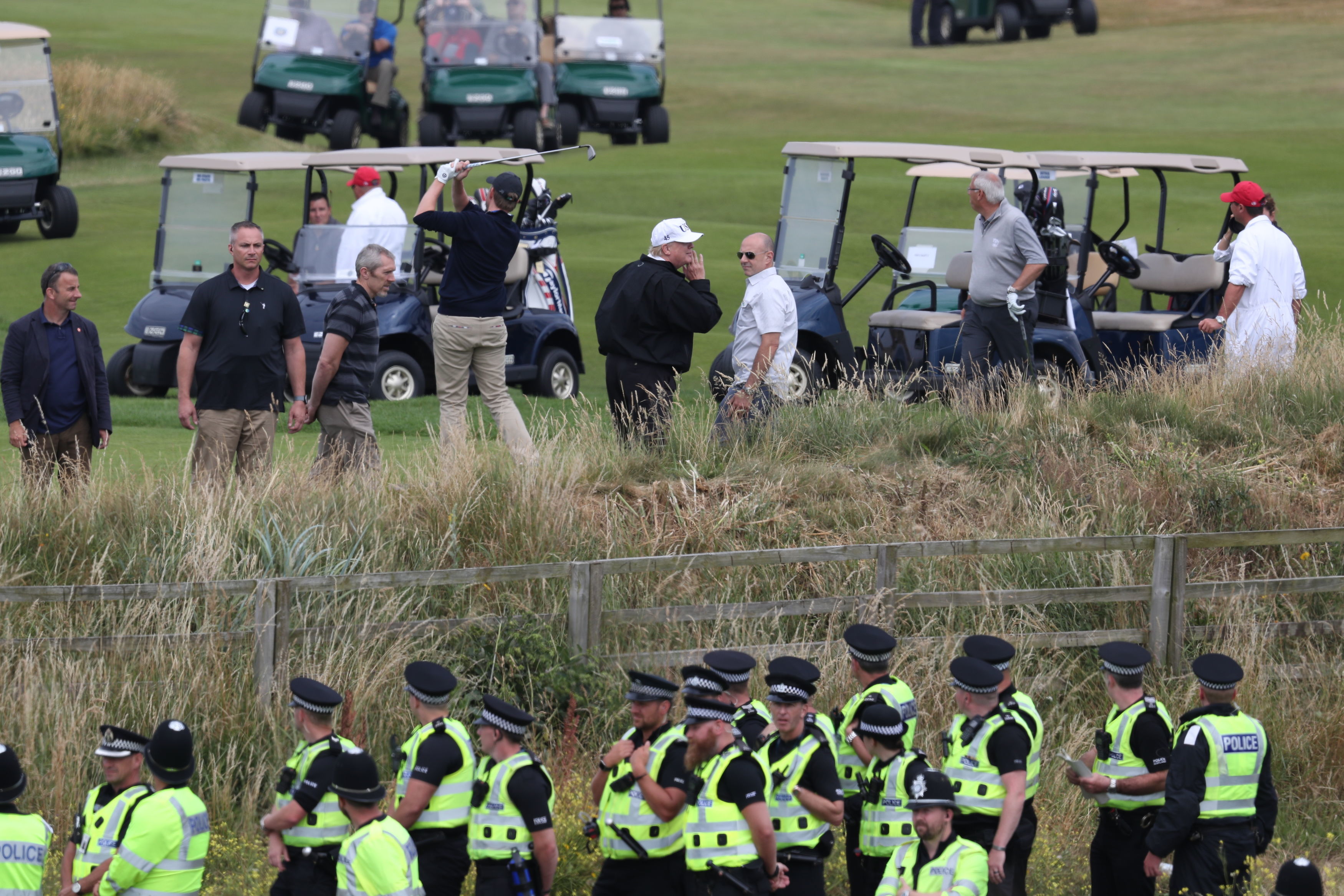 Police guard Donald Trump