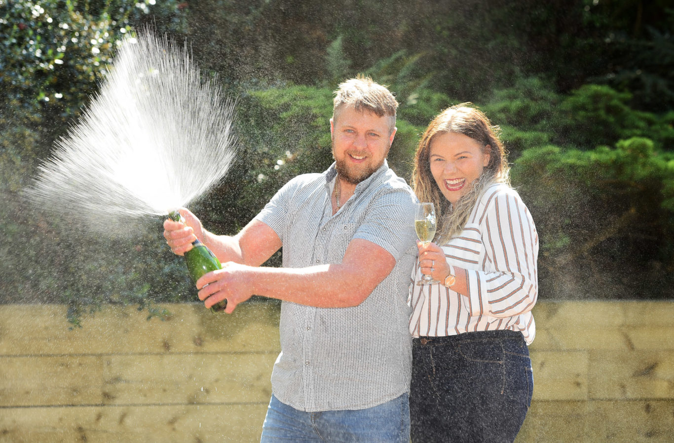 £1m Lotto Raffle winners Arron Walshaw and Ceri Hall (National Lottery/PA)