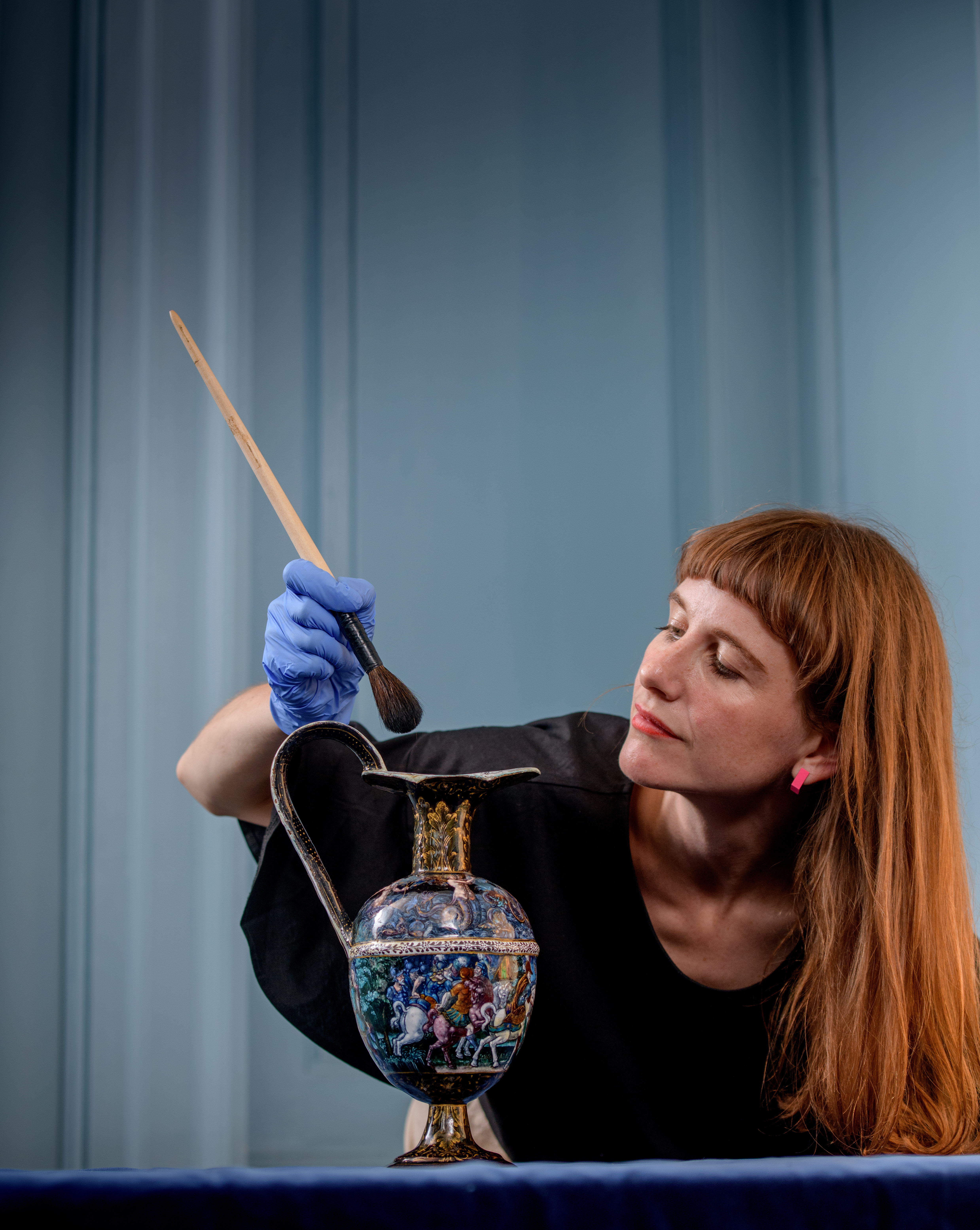 English Heritage Collections Curator Dr Sarah Moulden gives the Triton jug a final brush up before it goes on display at Ranger’s House (English Heritage)